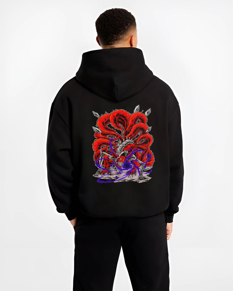 Black hoodie worn by a male model, back view, featuring Naruto Kurama Nine-Tails retro manga graphic with red tails and glowing chakra energy in poster style.