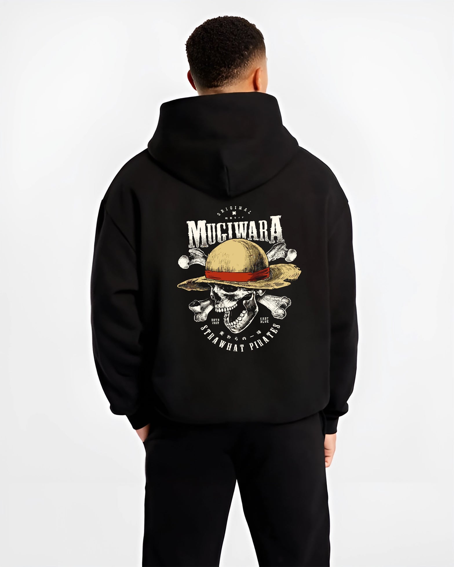 Black hoodie worn by a male model, back view, featuring One Piece Mugiwara skull and crossbones artwork in anime poster inspired design with retro streetwear vibe.