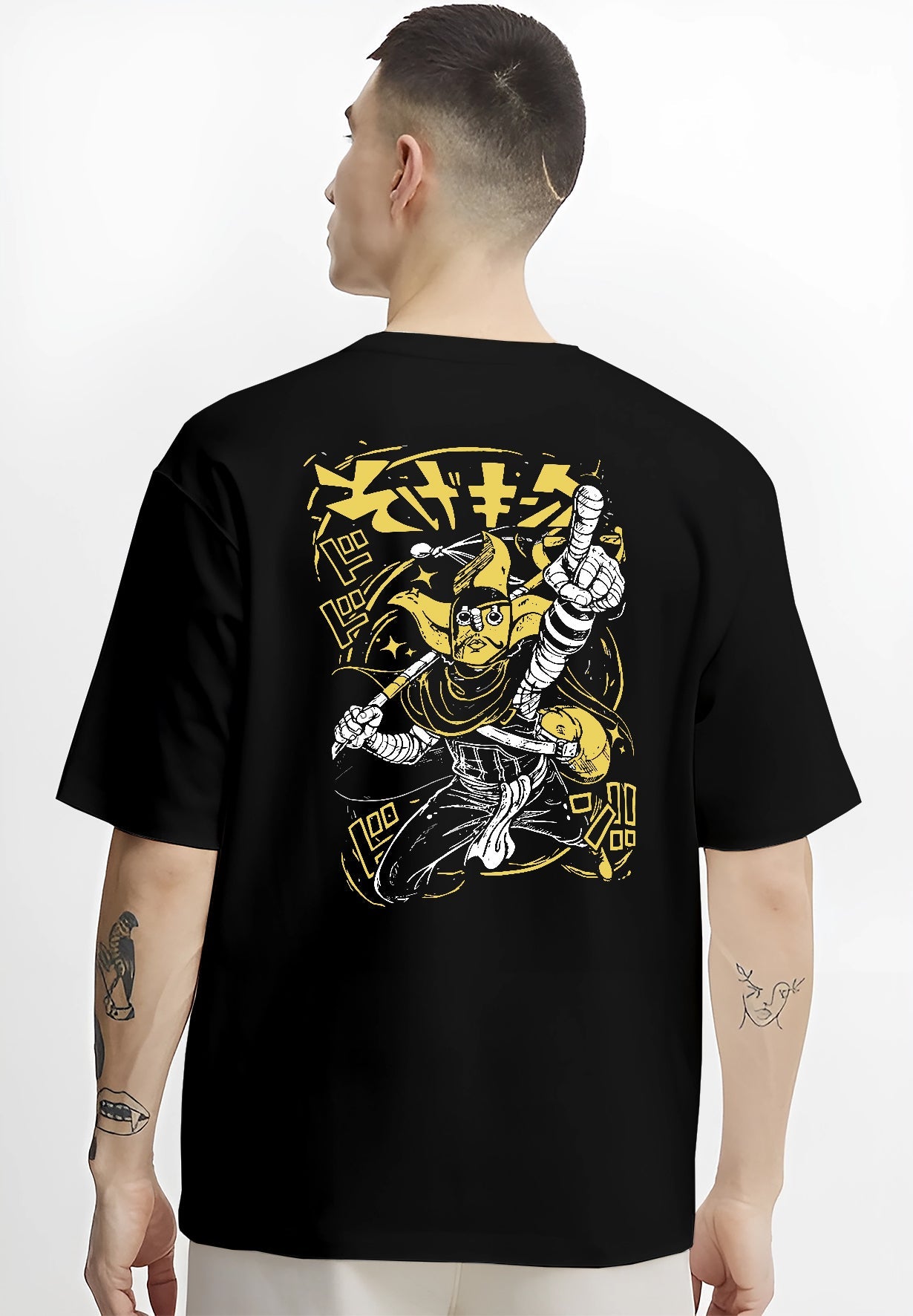 Black T-shirt worn by a male model, back view, featuring JoJo’s Bizarre Adventure retro comic inspired The World Stand artwork with bold yellow manga graphic details.