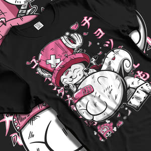 Black T-shirt laid flat with natural fabric folds, featuring One Piece Tony Tony Chopper anime inspired pink and white playful manga graphic design.