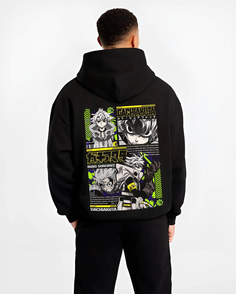 Black hoodie worn by male model, back view with Gachiakuta Rudo Hoodie Rebel Fighter Anime Jumper graphic bold anime graphic.