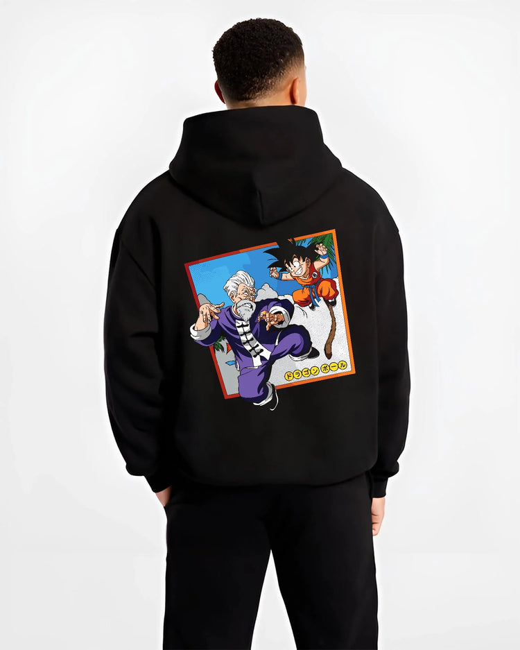 Black hoodie worn by male model, back view with Dragon Ball Hoodie Goku Training Retro Anime Panel graphic premium wear.