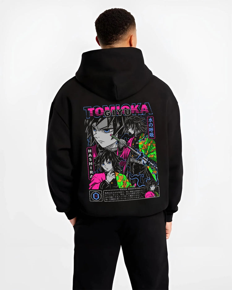 Black hoodie worn by male model, back view with Giyu Hoodie Demon Slayer Water Hashira Dual Faces graphic bold anime graphic.