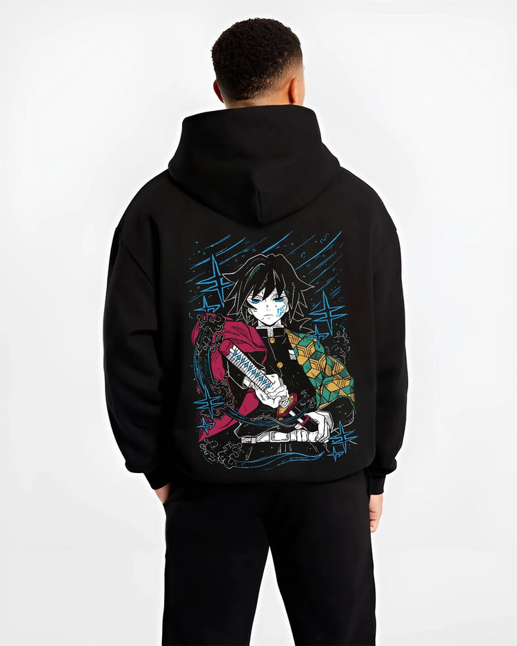 Black hoodie worn by male model, back view with Demon Slayer Hoodie Giyu Tomioka Upgraded Power Jumper graphic bold anime graphic.