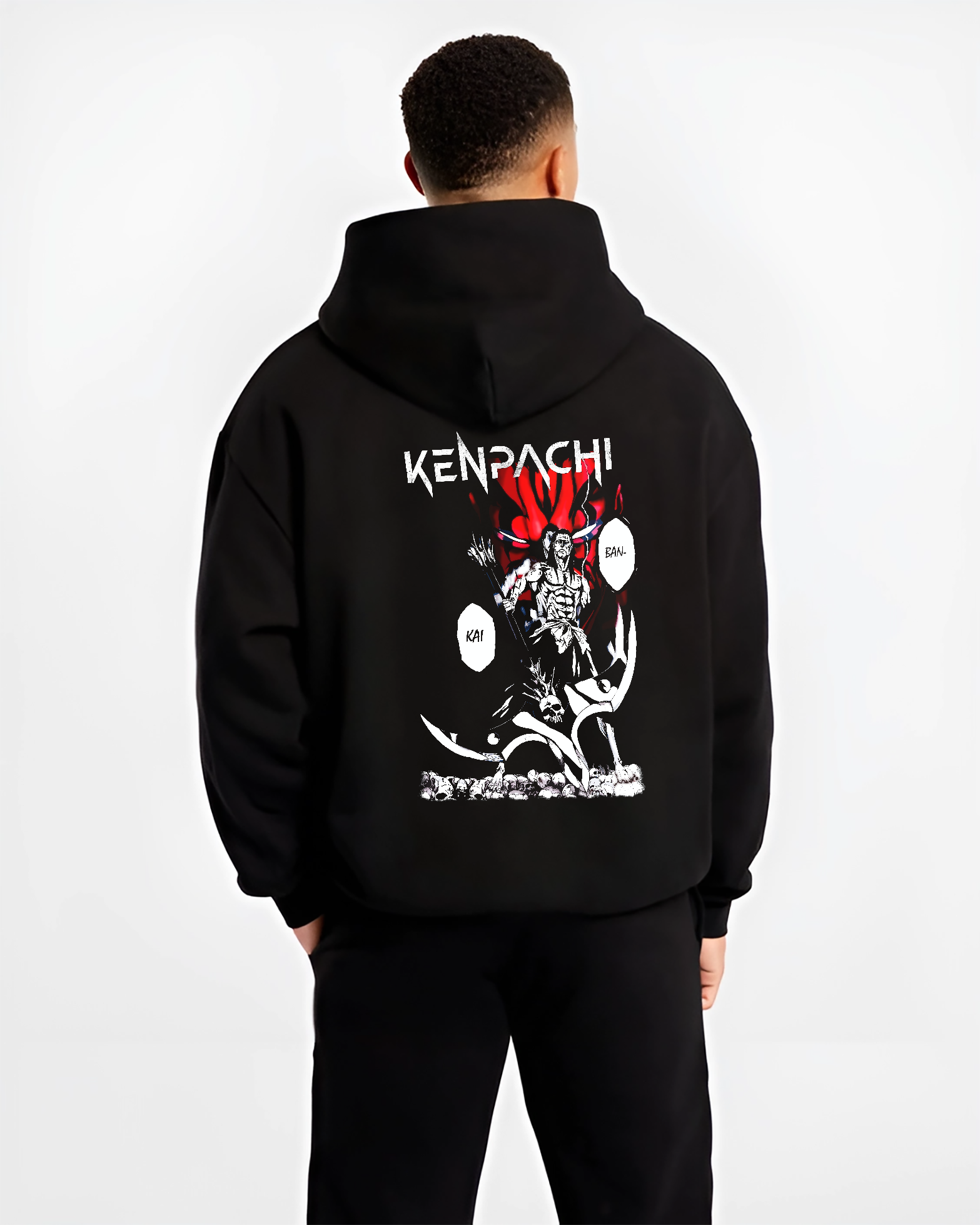 Black hoodie worn by a male model, back view, featuring Bleach Kenpachi Bankai retro manga graphic with demonic red aura and skull battlefield.