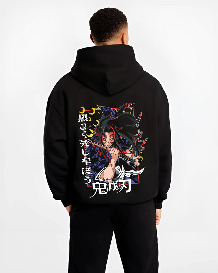 Black hoodie worn by male model, back view with Kokushibo Hoodie Demon Slayer Tragic Moon Form graphic streetwear graphic.