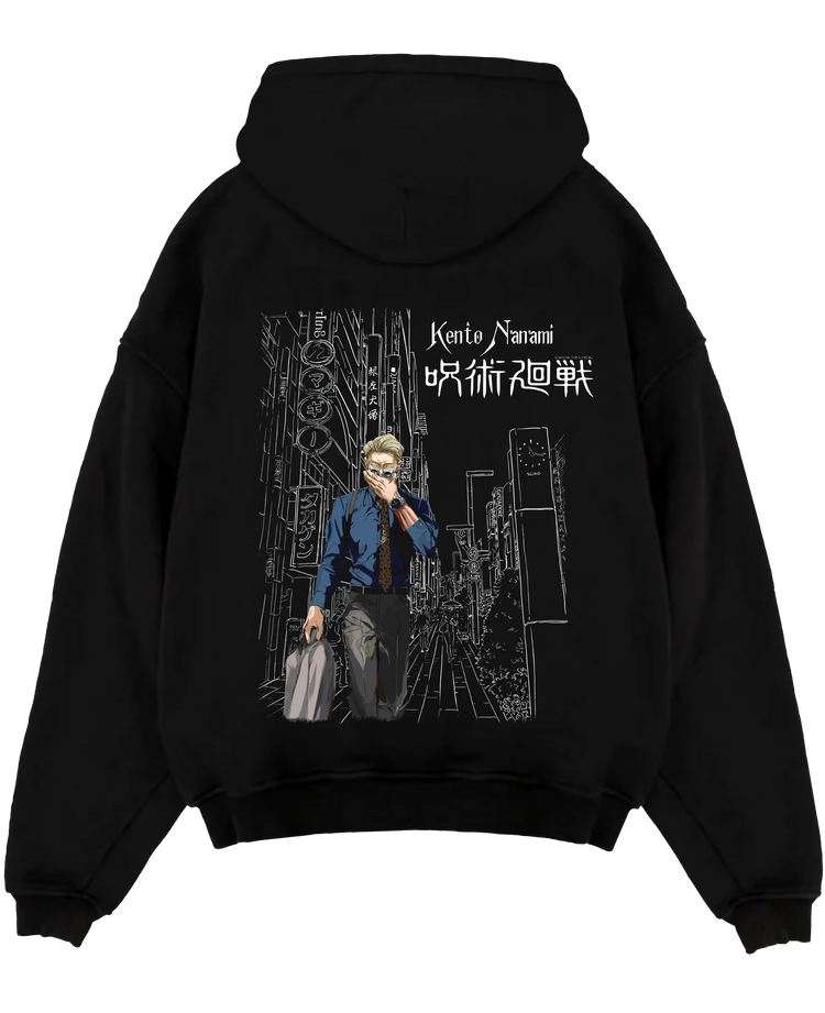 Black pullover hoodie laid flat on a white background, featuring Jujutsu Kaisen Nanami Kento anime poster inspired design with urban neo-noir manga city backdrop.