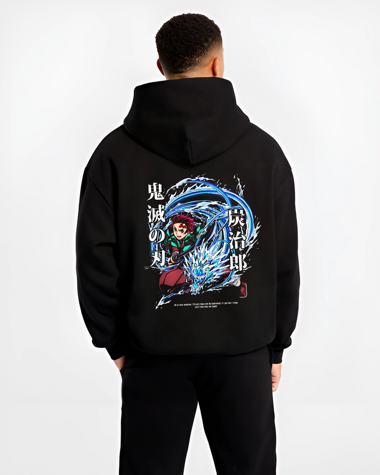 Black hoodie worn by a male model, back view, featuring Demon Slayer Tanjiro Kamado battle character artwork with Water Breathing dragon swirl, animation streetwear graphic.
