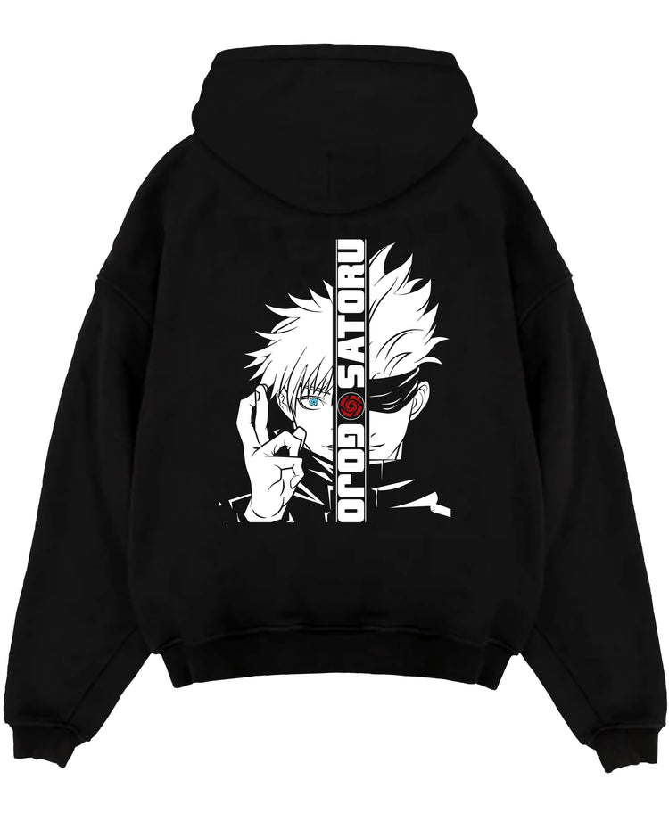 Black pullover hoodie laid flat on white, featuring Gojo Satoru split portrait manga graphic with vertical text and neon accents.