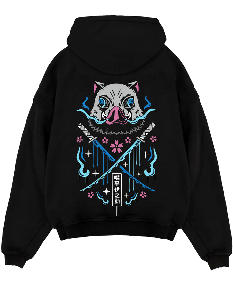 Black pullover hoodie laid flat on white, featuring Inosuke Demon Slayer boar mask back graphic with crossed blades, blue flames and cherry blossoms.
