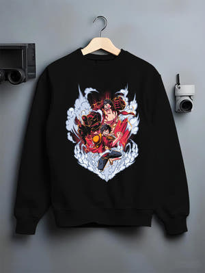 Black crewneck sweatshirt on hanger against grey wall, One Piece Luffy Gear battle poster graphic with smoke and vivid red energy.