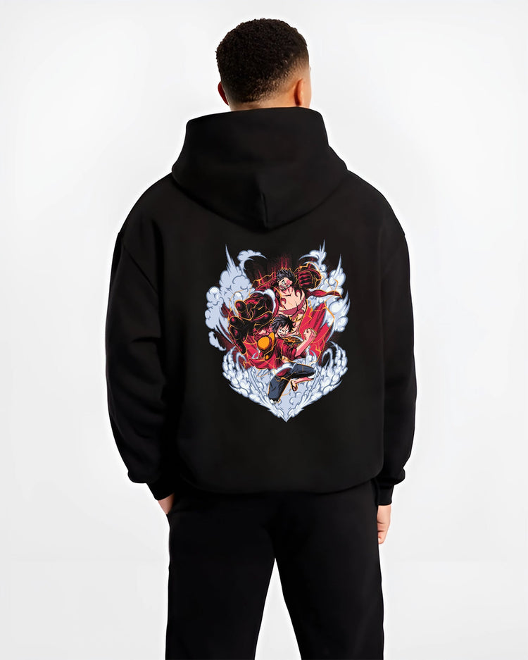 Black hoodie on male model, back view, showing One Piece Luffy Gear battle poster with smoke bursts and bold red lightning accents.