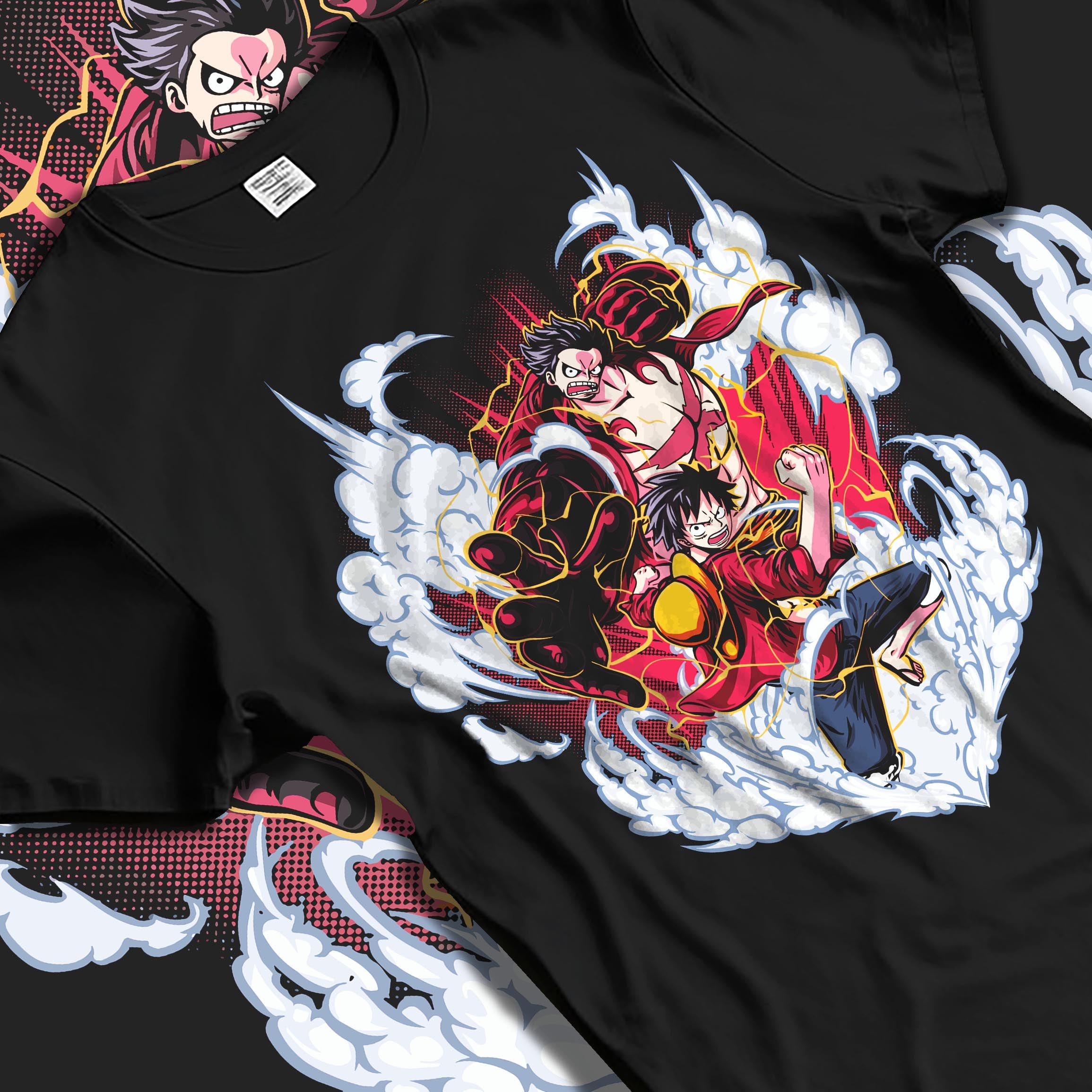 Black T-shirt laid flat with soft folds, featuring One Piece Luffy Gear fight retro manga design with smoke clouds and red lightning.