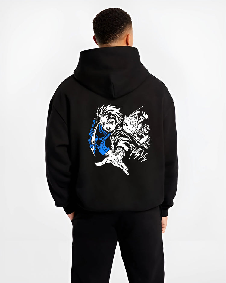 Black hoodie on male model, back view, featuring Tanjiro water-breathing blue slash and fox mask retro manga artwork.