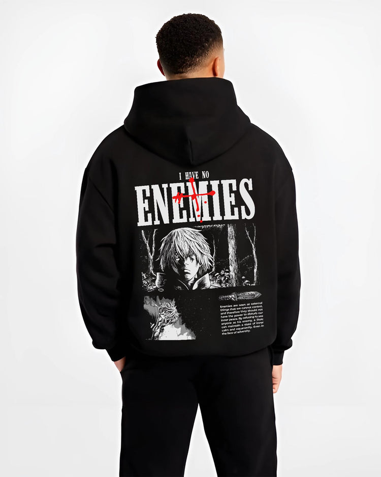 Black hoodie on male model, back view, Vinland Saga Thorfinn neo-noir panel design with “I Have No Enemies” text.