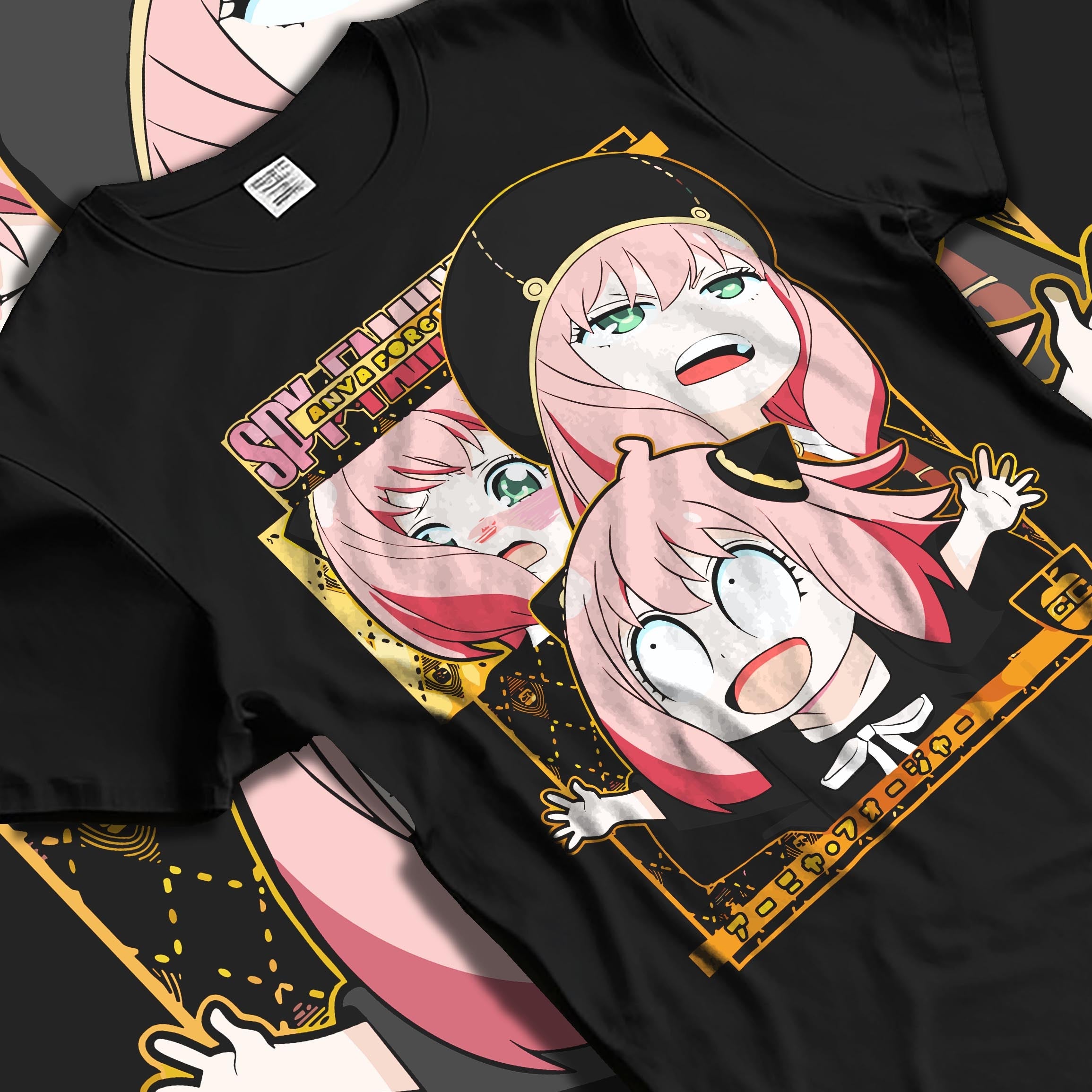 Black T-shirt laid flat featuring Anya Forger from Spy x Family in multiple comic expressions, retro anime streetwear graphic with gold accents.