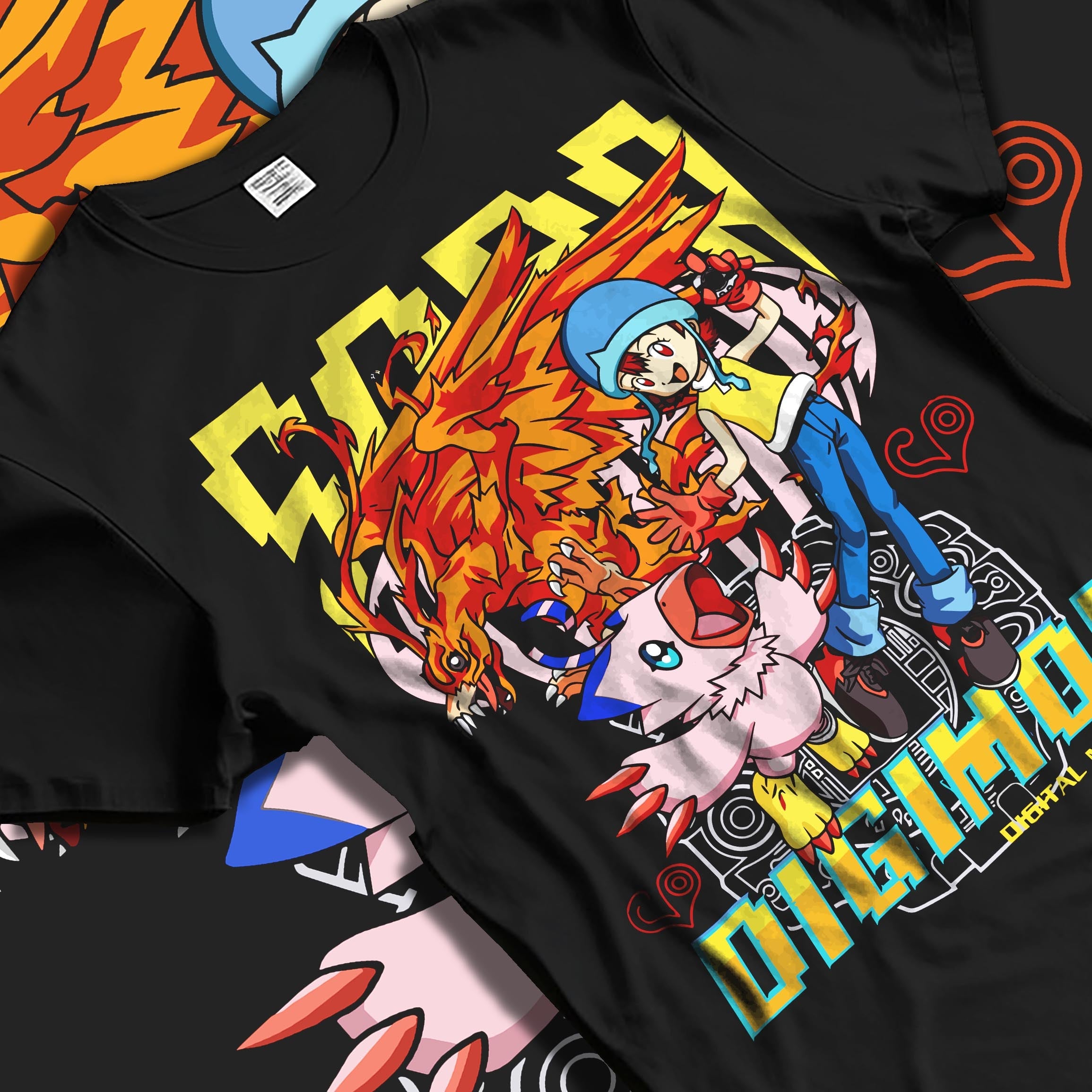Black T-shirt laid flat featuring Digimon Adventure anime design with Tai, Agumon, and fiery Digimon battle graphic in vibrant retro streetwear style.