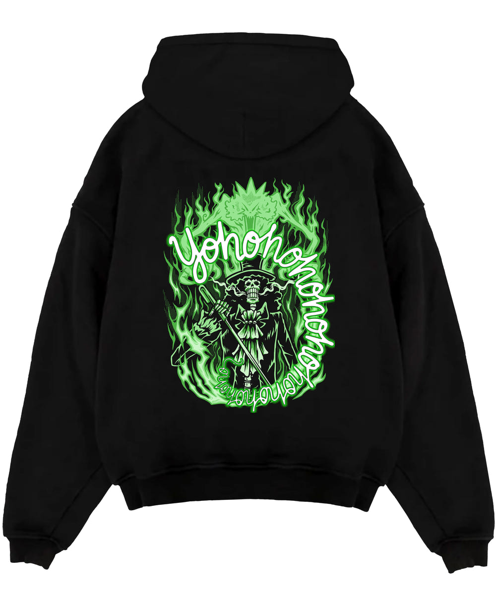 Black pullover hoodie laid flat on a white background, featuring One Piece Brook anime poster inspired design with glowing green flames and retro manga artwork print.