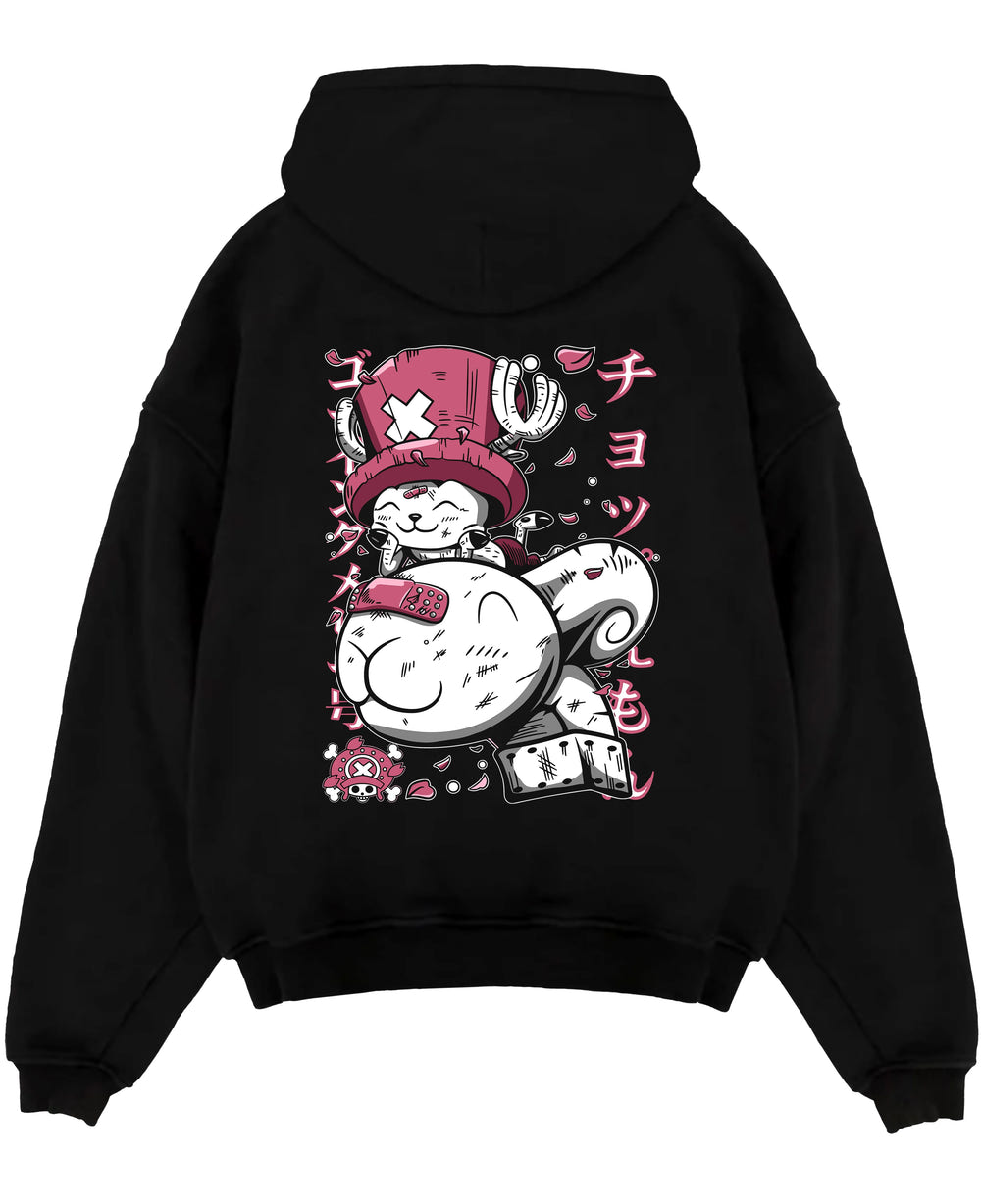Black pullover hoodie laid flat on a white background, featuring Tony Tony Chopper retro manga graphic with playful pink tones and Japanese text accents.