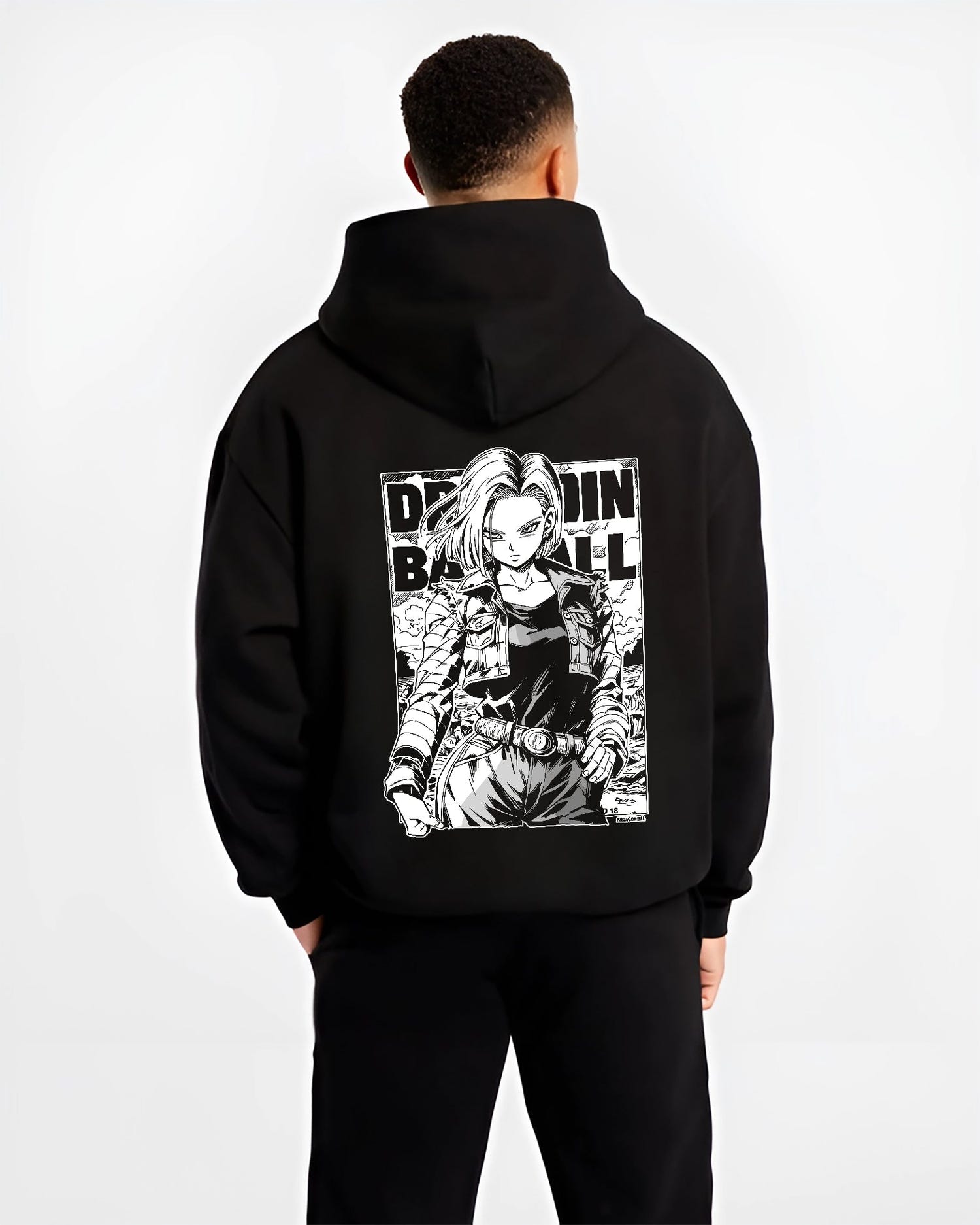 Black hoodie worn by a male model, back view, featuring Dragon Ball Android 18 dark manga panel artwork with retro streetwear graphic in Japanese animation style.