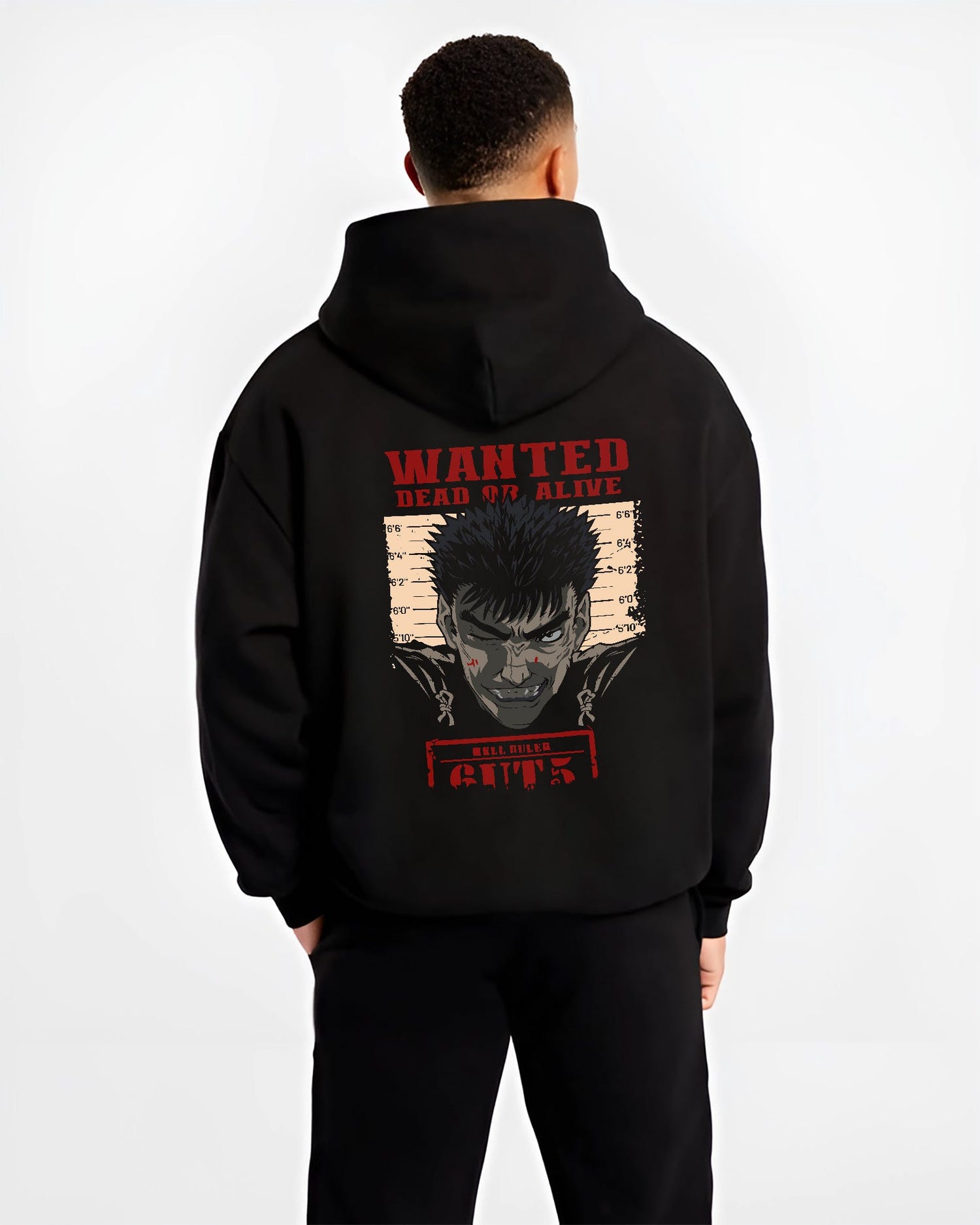 Black hoodie worn by a male model, back view, featuring Berserk retro manga graphic of Guts in wanted dead or alive poster style with bold red highlights.