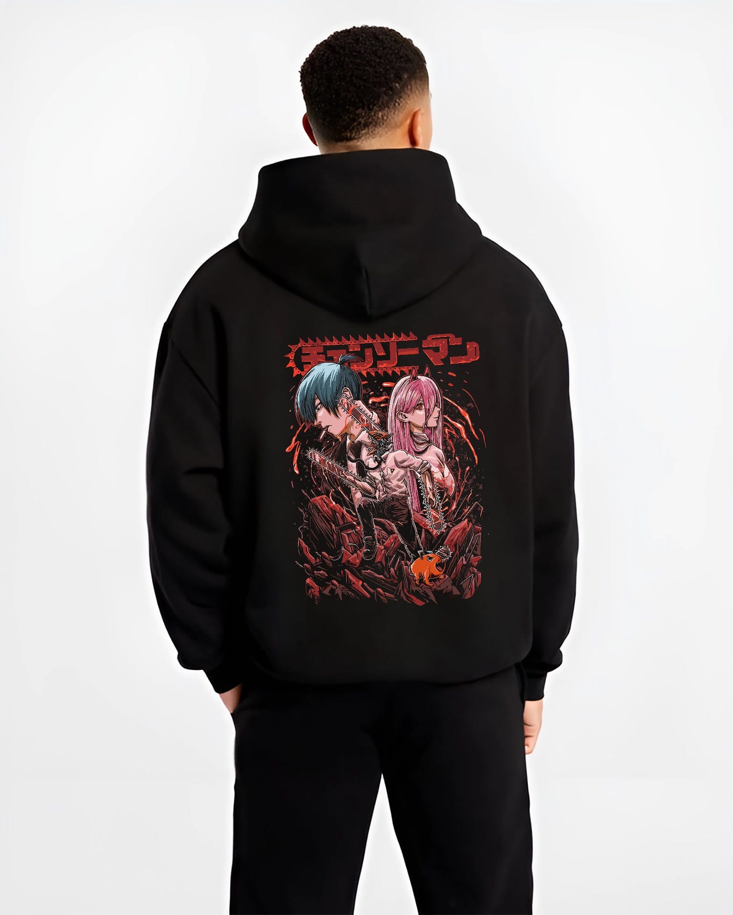 Black hoodie worn by a male model, back view, featuring Chainsaw Man characters Power and Aki in gritty anime poster inspired design with red horror manga aesthetic.
