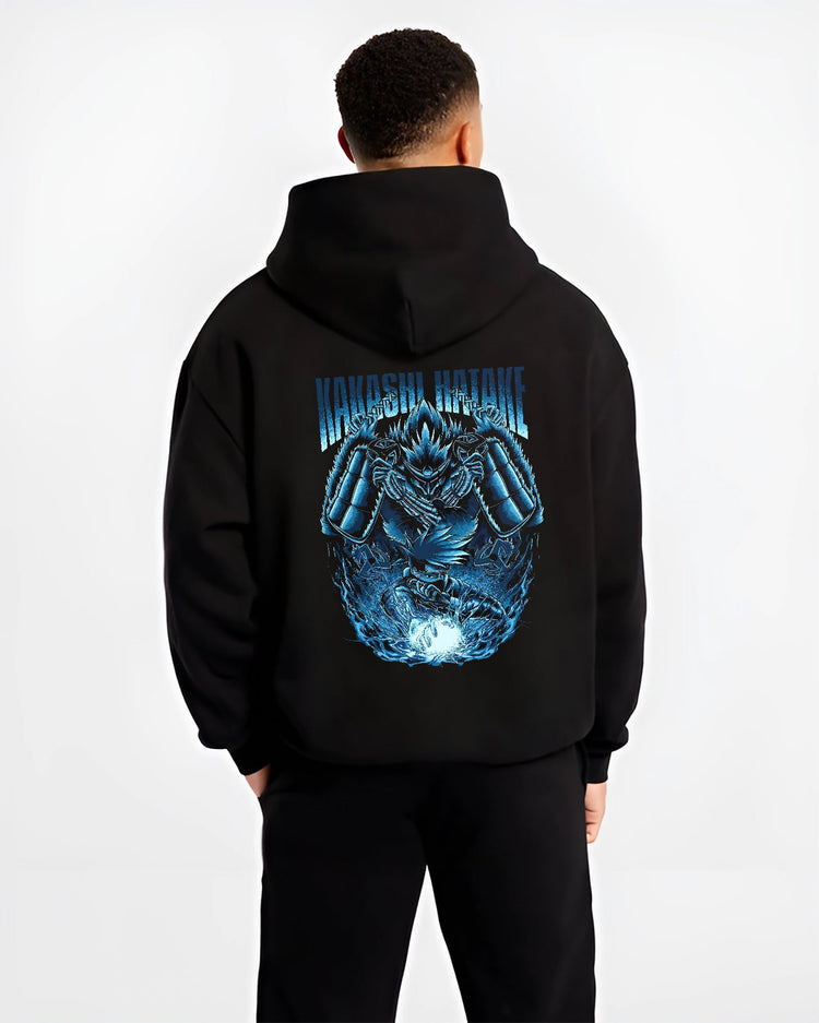 Black hoodie worn by a male model, back view, featuring Kakashi Hatake shonen battle character design with Susanoo aura and retro manga artwork.