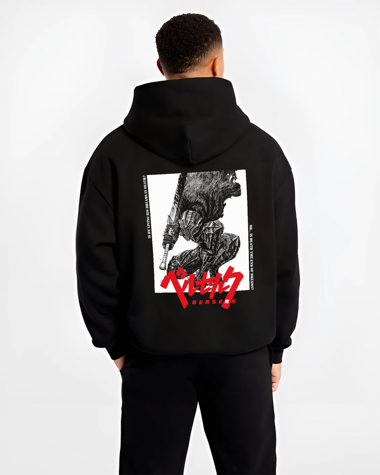 Black hoodie worn by a male model, back view, featuring Berserk Guts retro manga graphic with bold red lettering in anime poster inspired horror panel artwork.