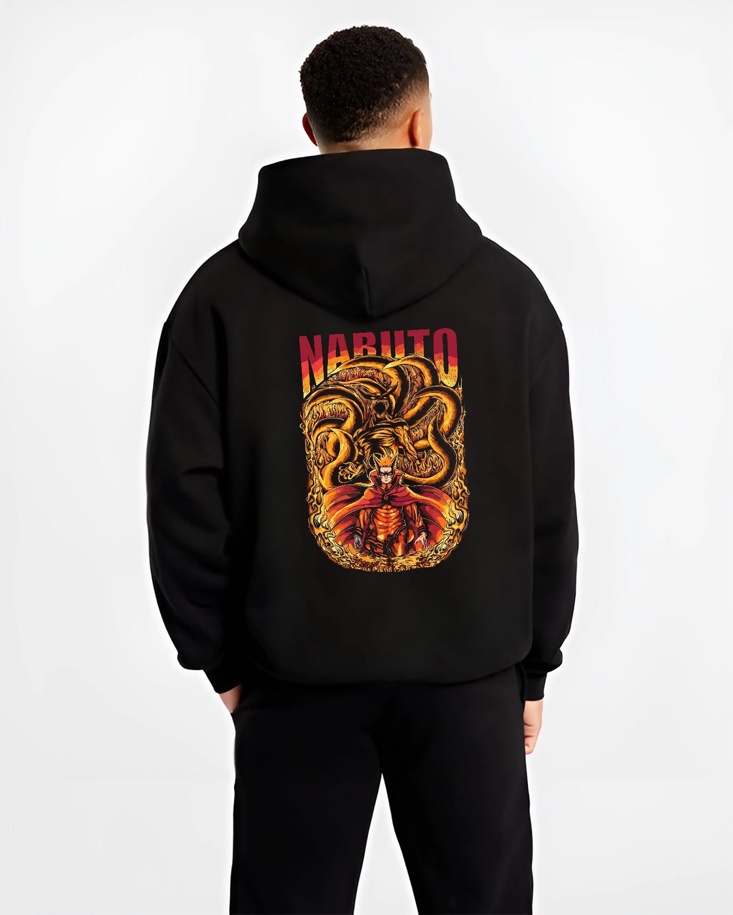 Black hoodie worn by a male model, back view, featuring Naruto with Kurama fiery retro manga style artwork in anime poster inspired design.