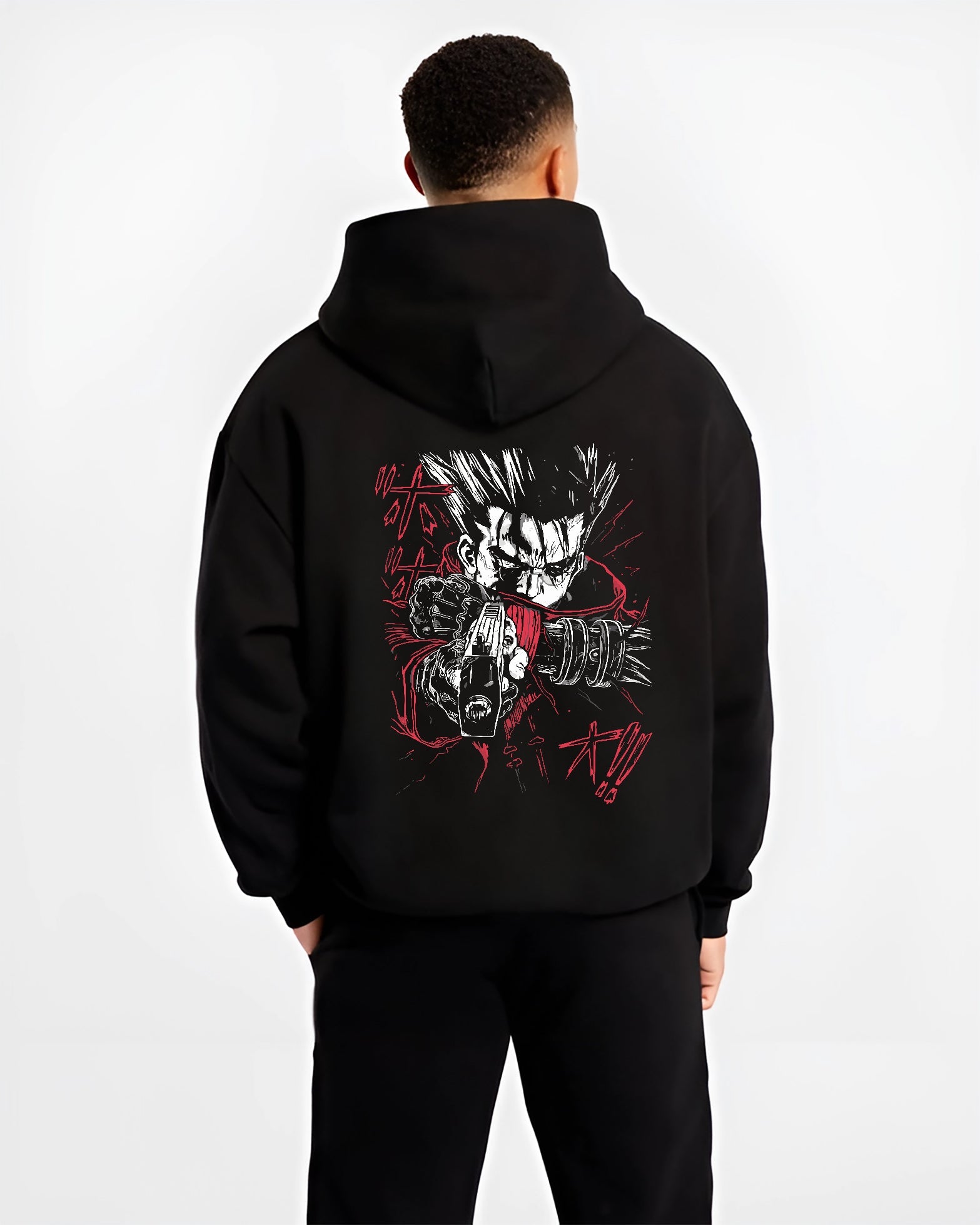 Black hoodie worn by a male model, back view, featuring Vash the Stampede anime poster inspired retro streetwear graphic with intense red and black tones.