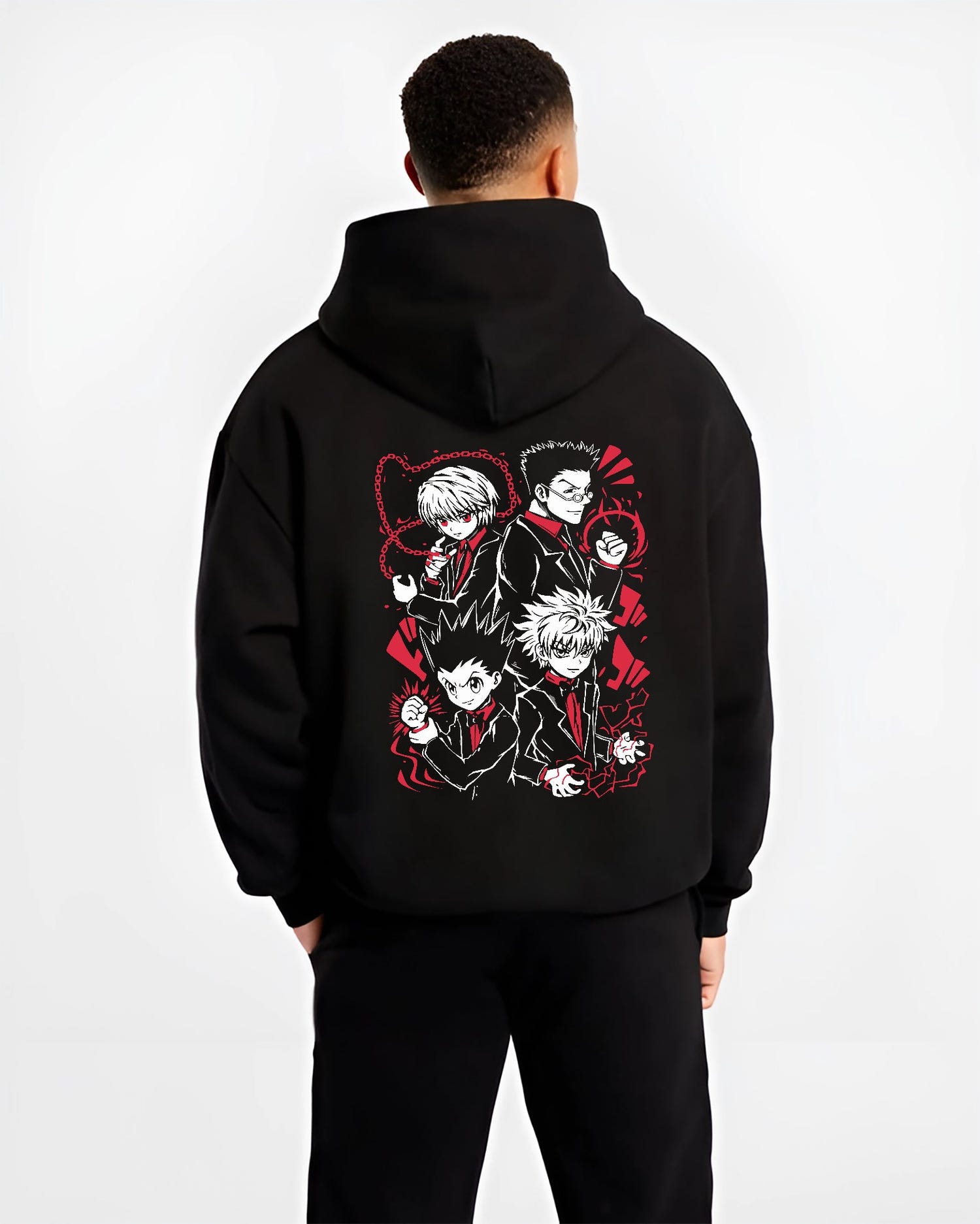 Black hoodie worn by a male model, back view, featuring Hunter x Hunter retro manga graphic of Gon, Killua, Kurapika, and Leorio in stylish suit themed artwork.