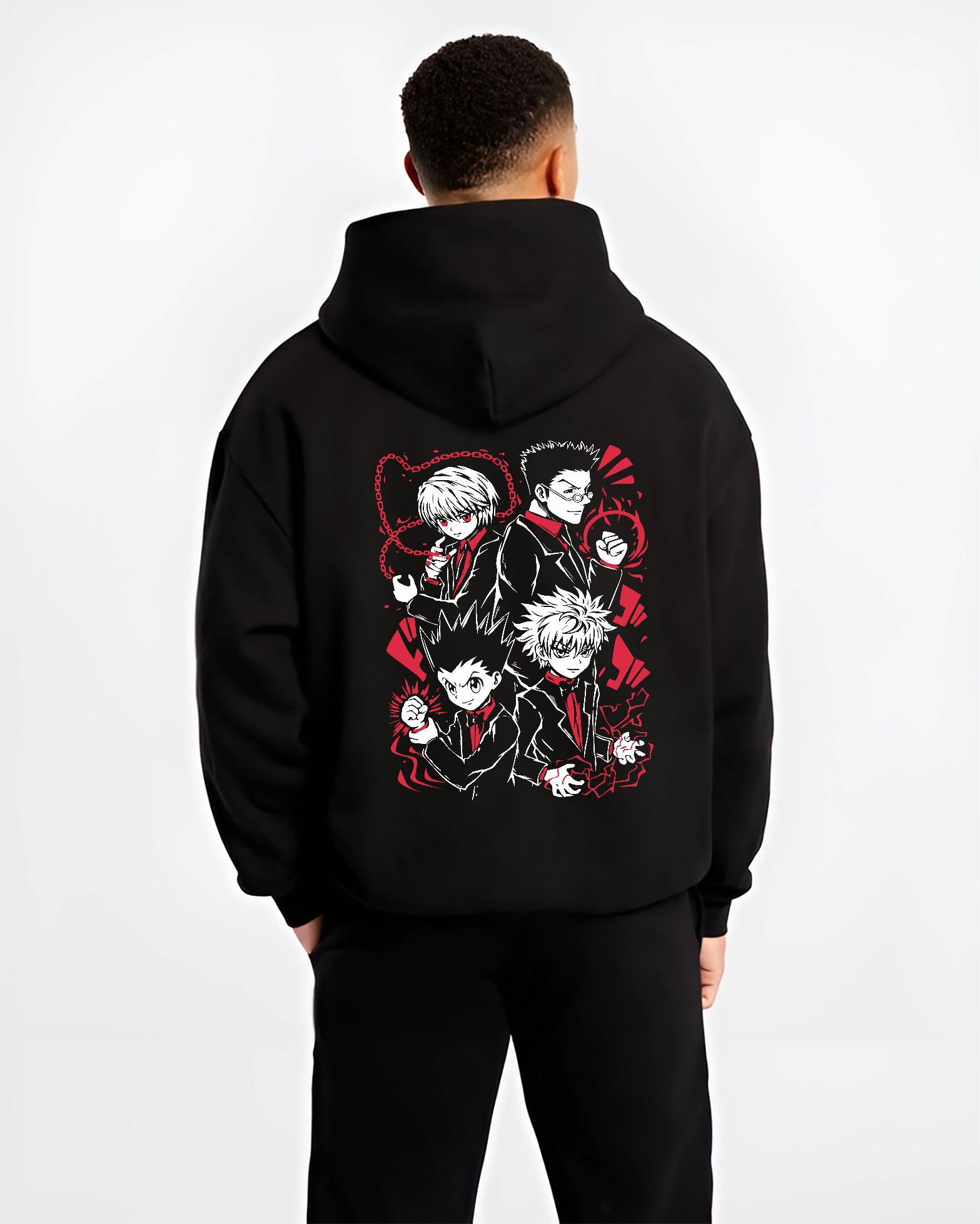 Black hoodie worn by a male model, back view, featuring Hunter x Hunter retro manga graphic of Gon, Killua, Kurapika, and Leorio in stylish suit themed artwork.