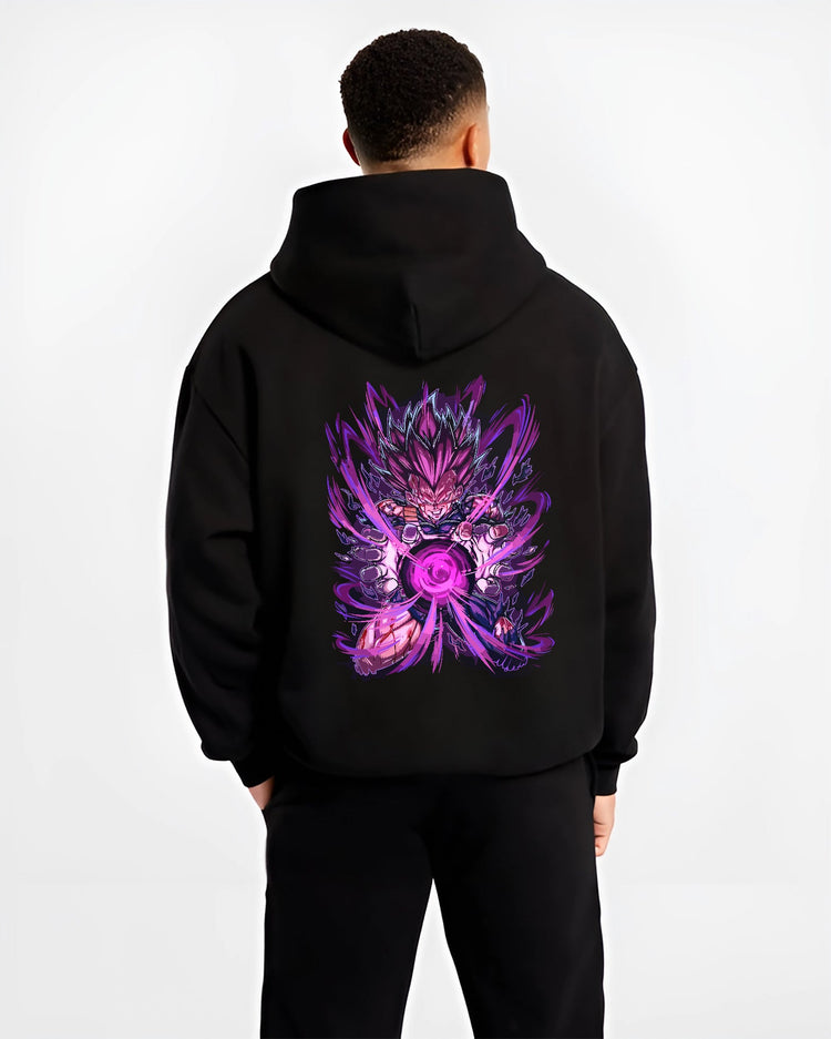 Black hoodie worn by a male model, back view, featuring Dragon Ball Vegeta anime poster inspired artwork with shonen battle energy blast and retro manga style.
