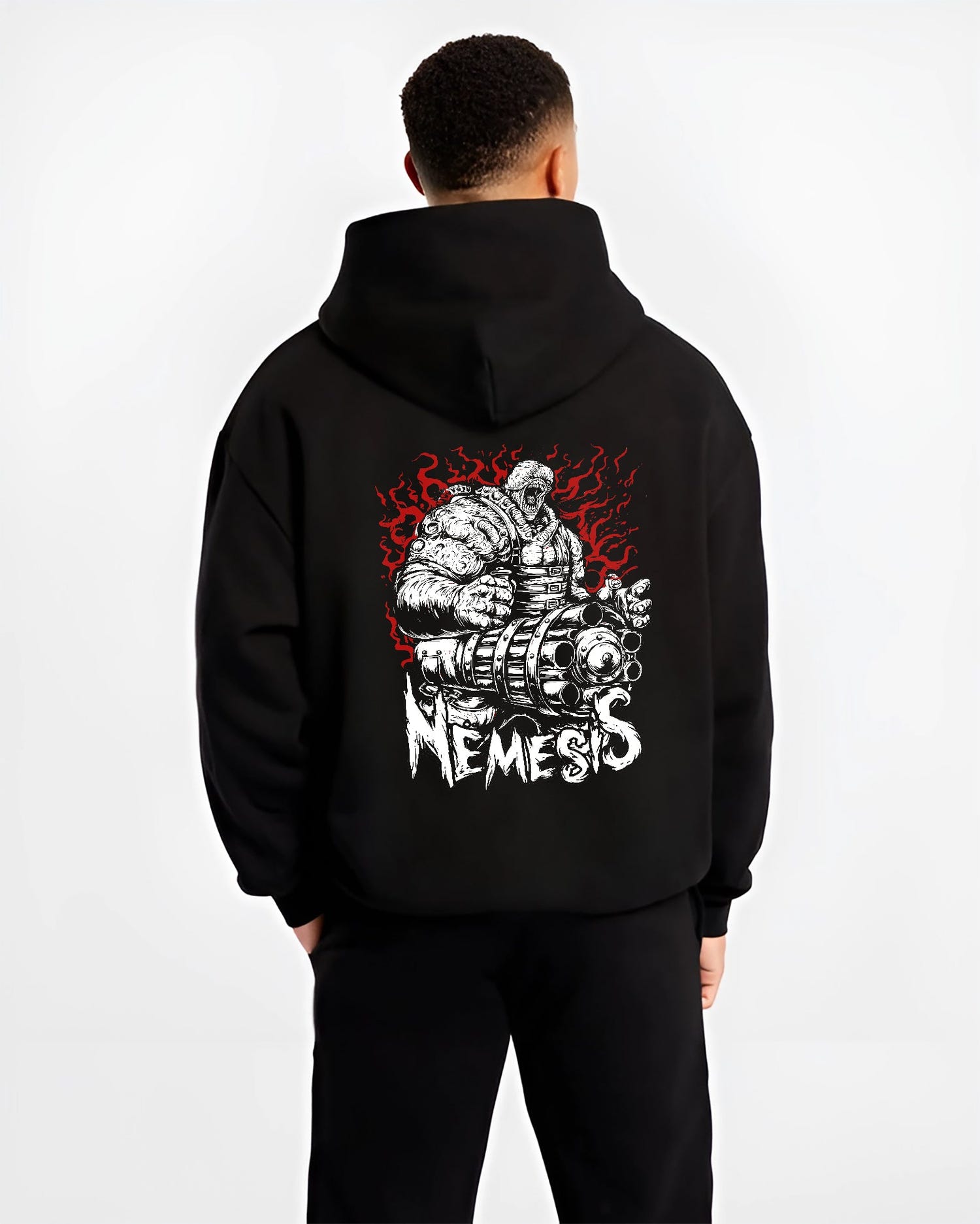 Black hoodie worn by a male model, back view, featuring Nemesis Resident Evil neo-noir comic inspired design with apocalyptic retro horror tones.