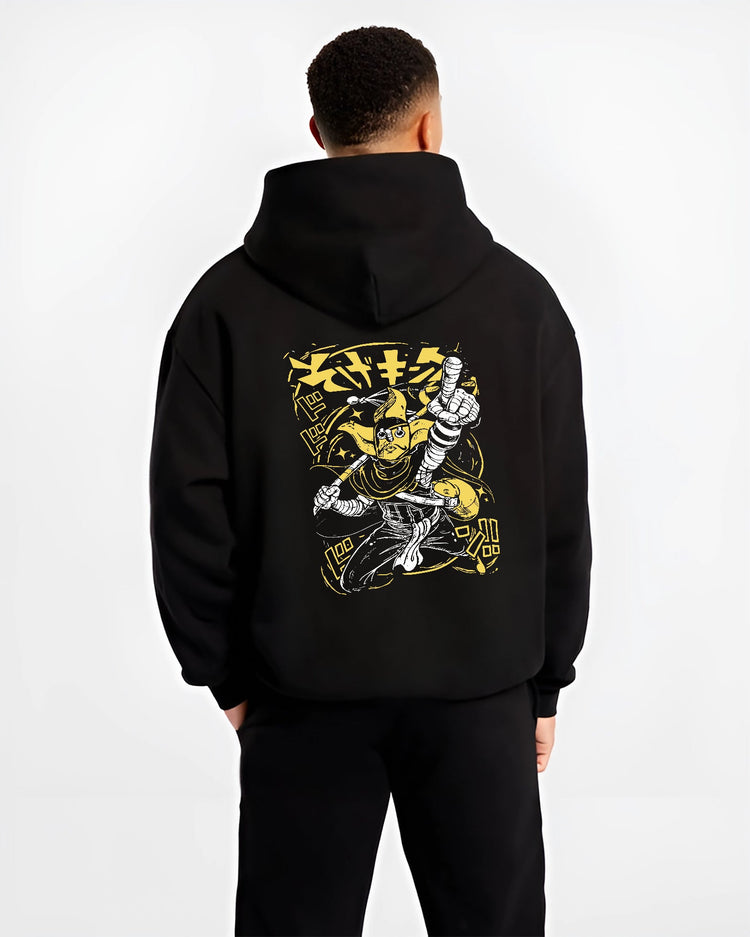 Black hoodie worn by a male model, back view, featuring JoJo’s Bizarre Adventure anime poster inspired The World Stand artwork with striking yellow retro streetwear design.