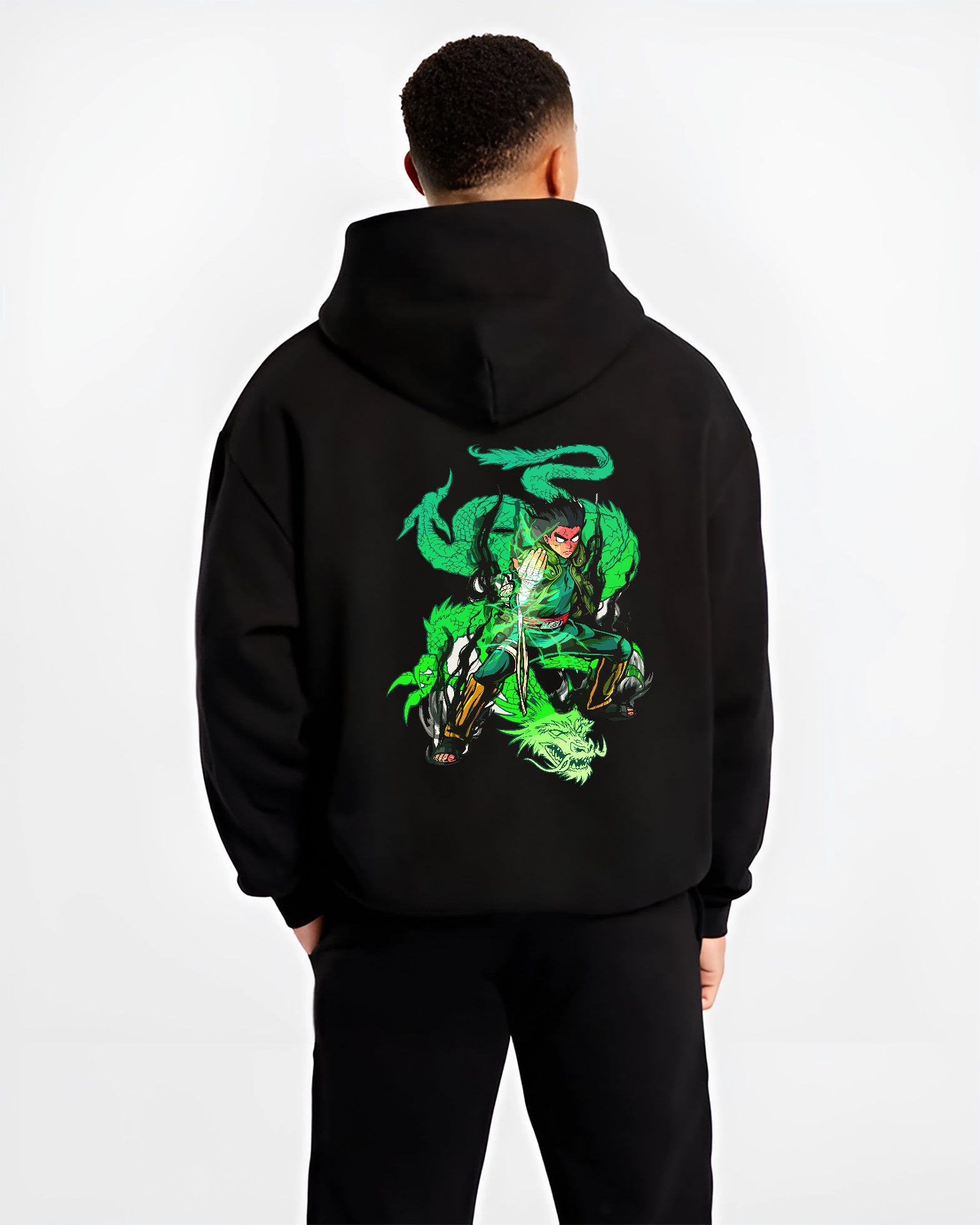 Black hoodie worn by a male model, back view, featuring Dragon Ball Gohan shonen battle character with Shenron dragon aura in anime poster inspired retro manga design.