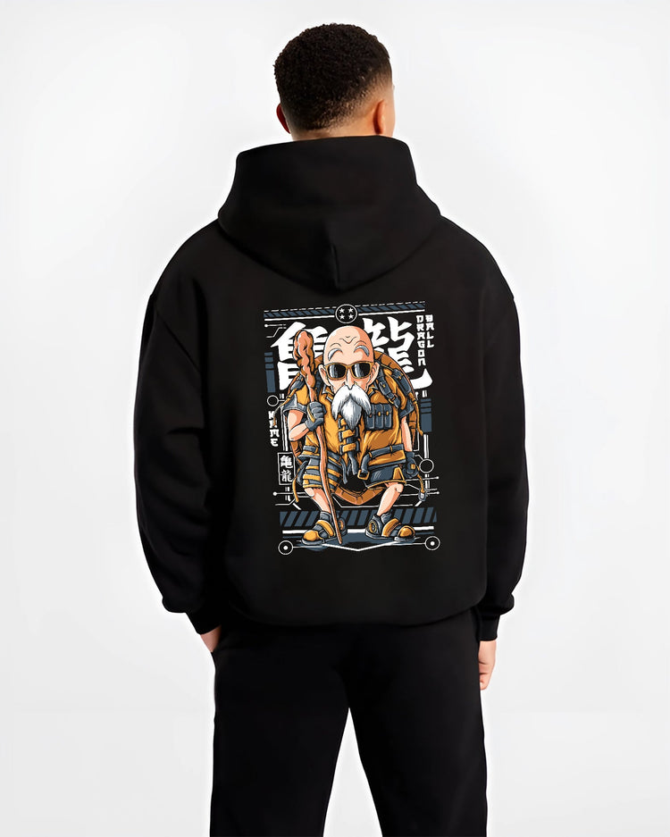 Black hoodie worn by a male model, back view, featuring Dragon Ball Master Roshi retro manga graphic artwork with bold Japanese animation style.