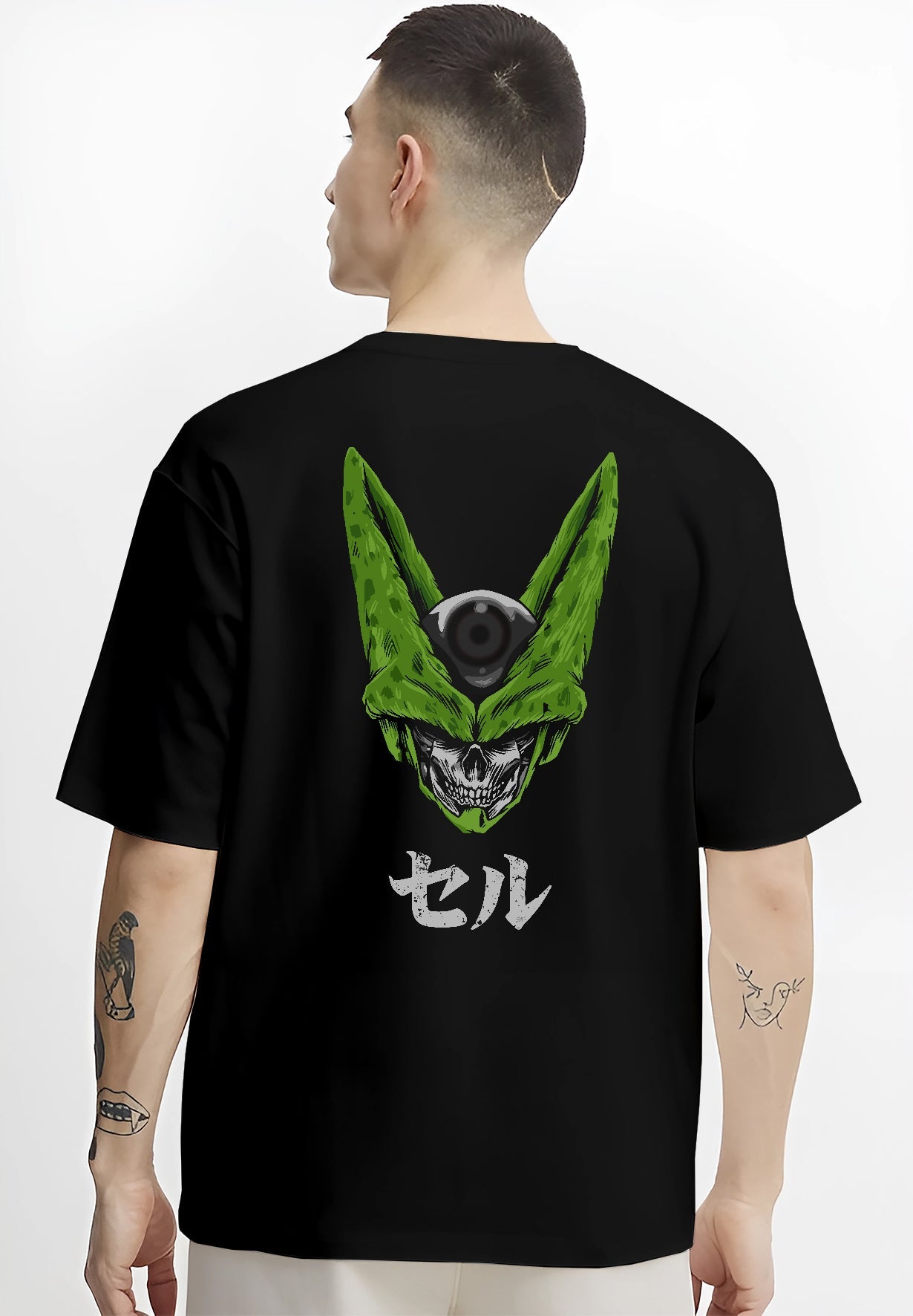Black hoodie worn by a female model, back view, featuring Dragon Ball Cell skull fusion retro manga graphic in modern streetwear design.
