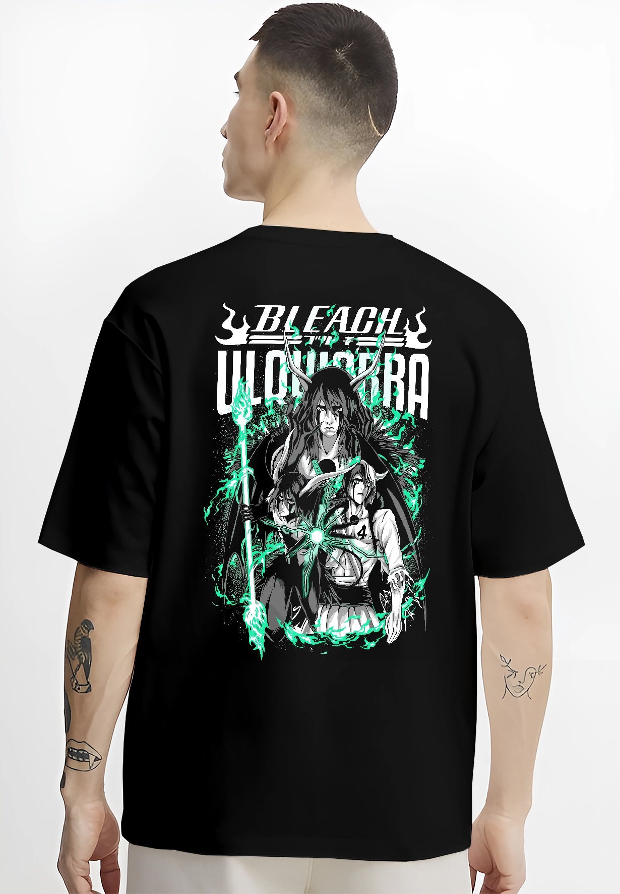 Black T-shirt worn by a male model, back view, featuring Bleach Ulquiorra shonen battle character artwork styled in dark manga retro aesthetic.
