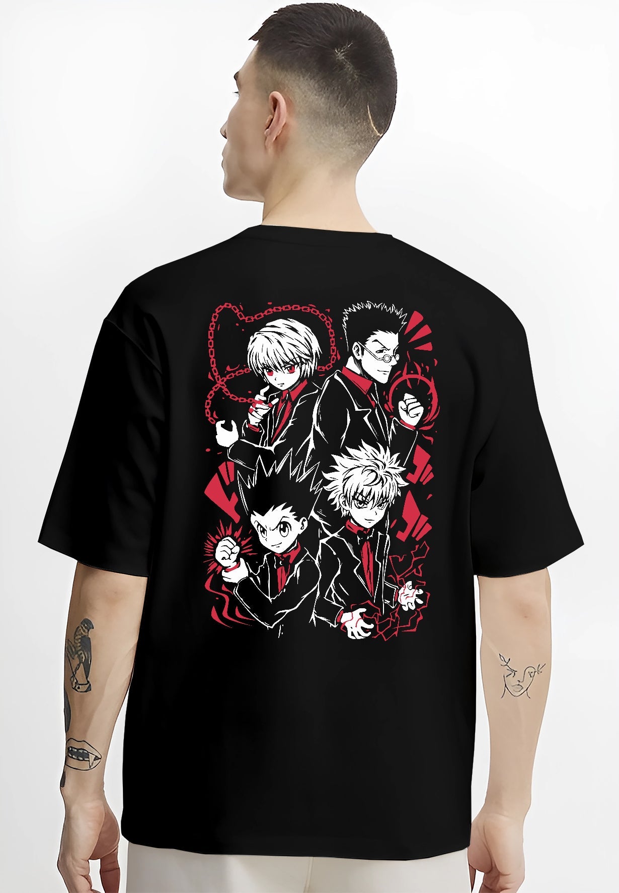 Black T-shirt worn by a male model, back view, featuring Hunter x Hunter retro manga style group artwork of Gon, Killua, Kurapika, and Leorio in bold red tone design.