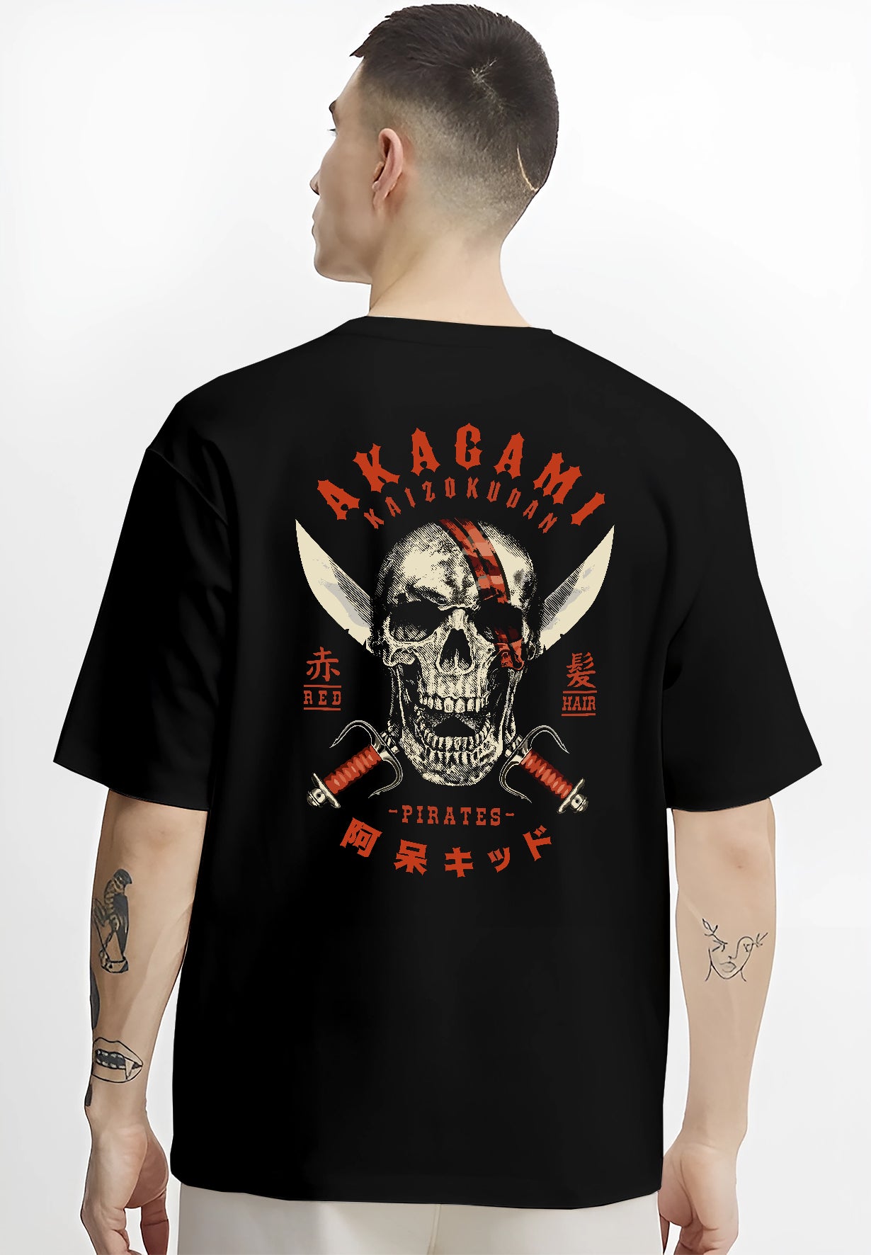 Black T-shirt worn by a male model, back view, featuring Akagami Red Hair Pirates skull comic villain inspired artwork with dark retro tones.
