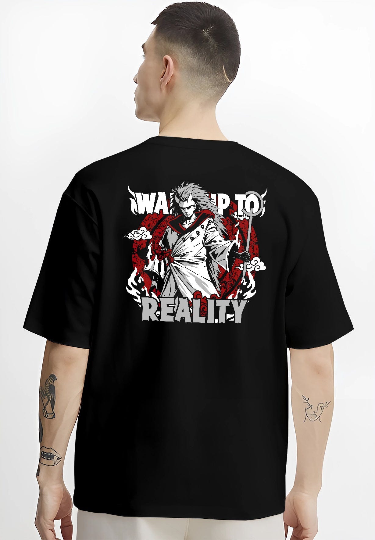 Black T-shirt worn by a male model, back view, featuring Naruto Madara Uchiha shonen battle character design with “Wake Up to Reality” slogan in retro manga graphic