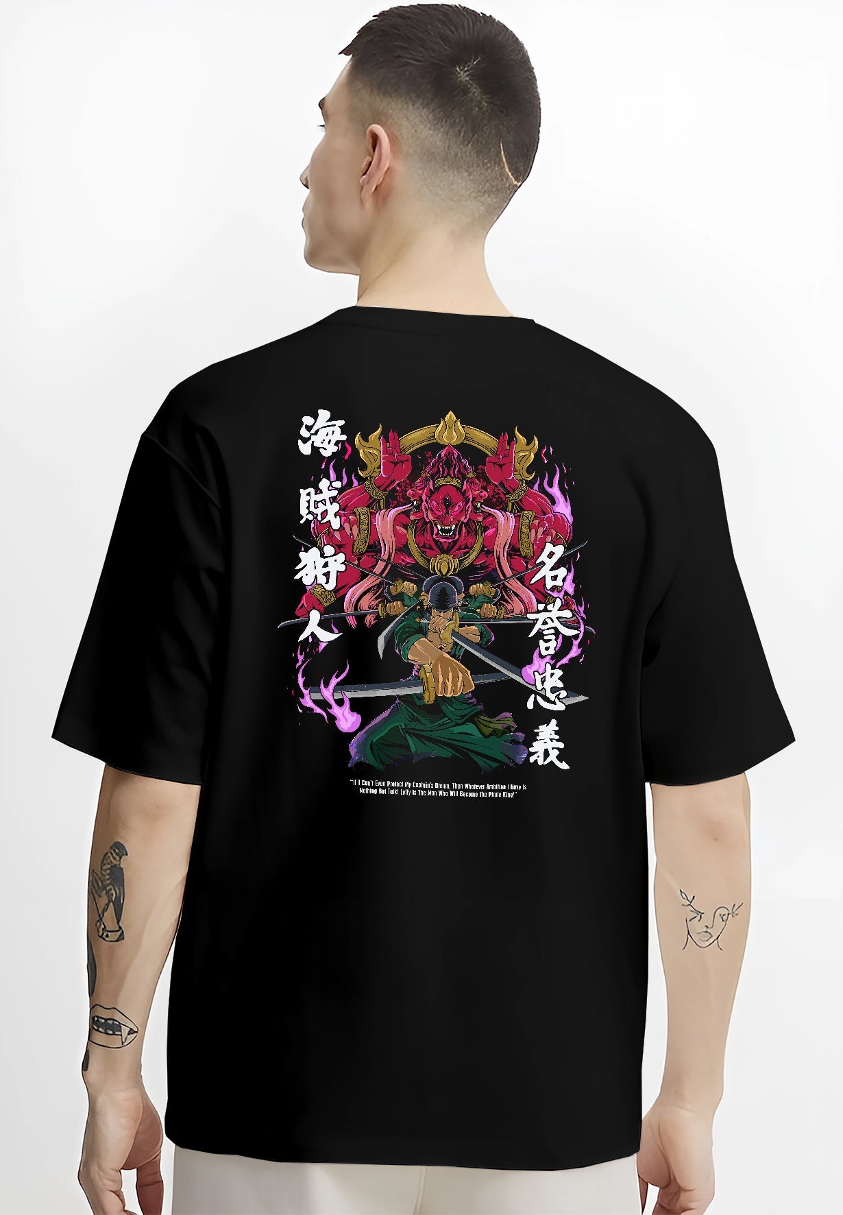 Black T-shirt worn by a male model, back view, featuring Zoro One Piece shonen battle character artwork with glowing purple aura and samurai spirit inspired design.