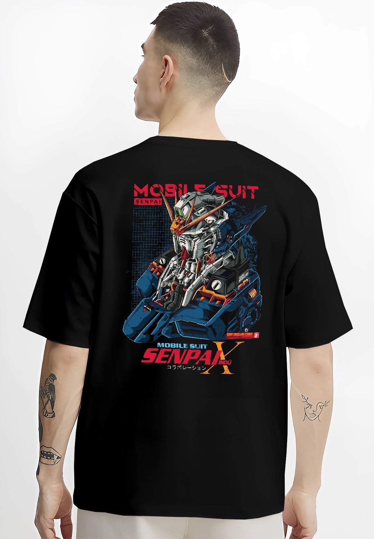 Black T-shirt worn by a male model, back view, featuring Mobile Suit retro mecha anime poster inspired design with bold robotic armor and cyberpunk gaming aesthetic.