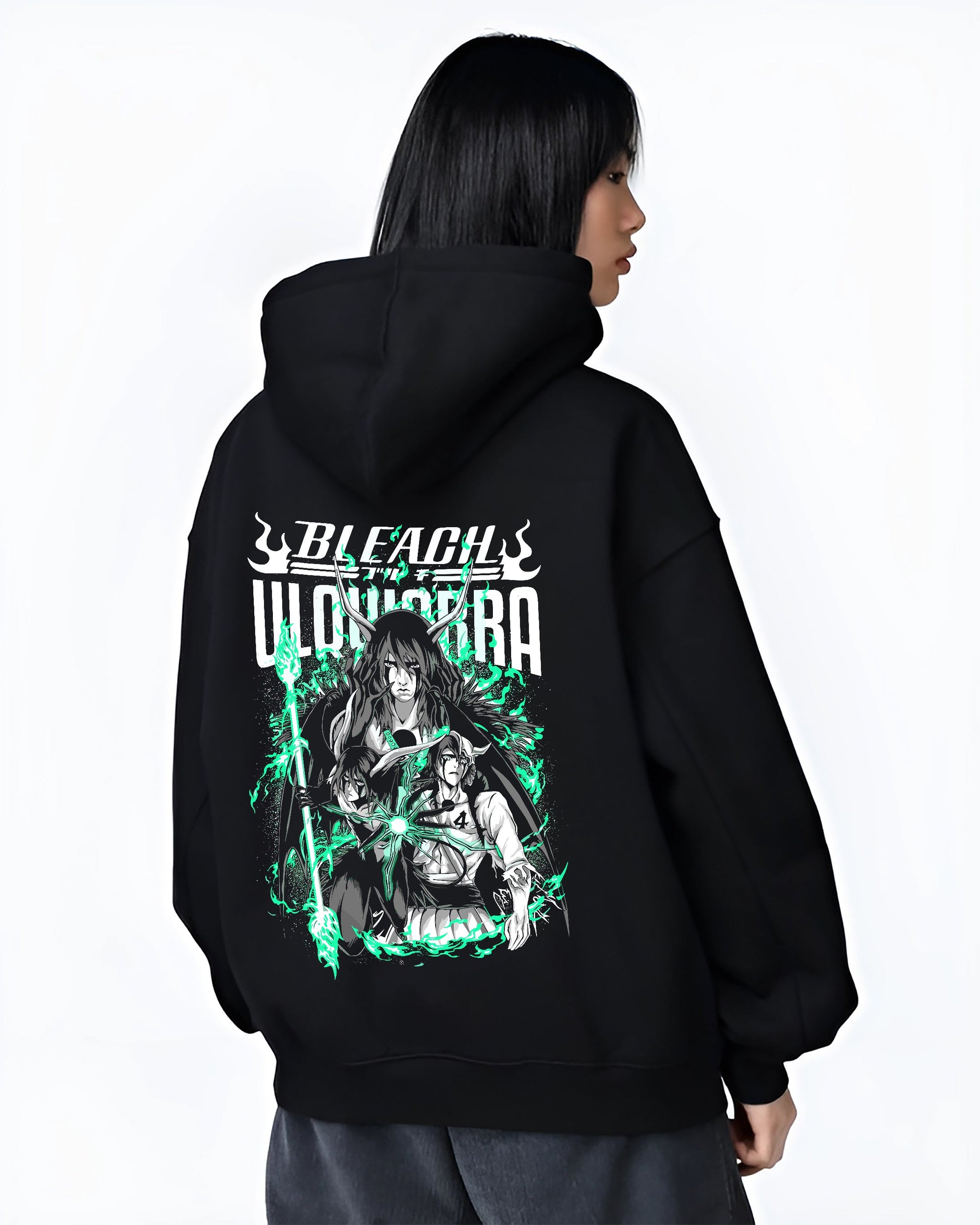 Black hoodie worn by a female model, back view, featuring Bleach Ulquiorra anime poster inspired artwork with glowing neon manga streetwear style.