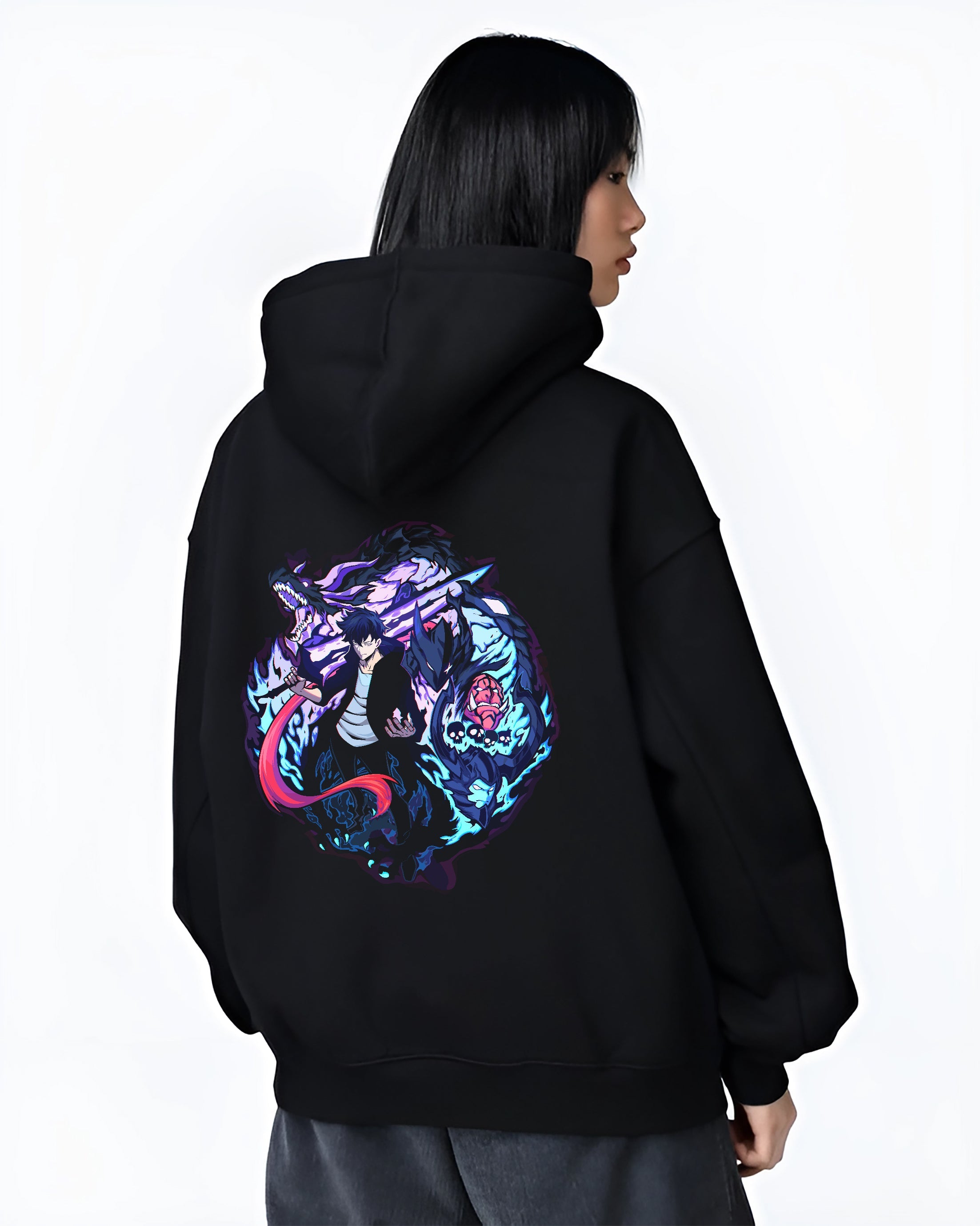 Black hoodie worn by a female model, back view, featuring Jinwoo Sung retro manga graphic design with shadow dragon flames and detailed sword artwork.