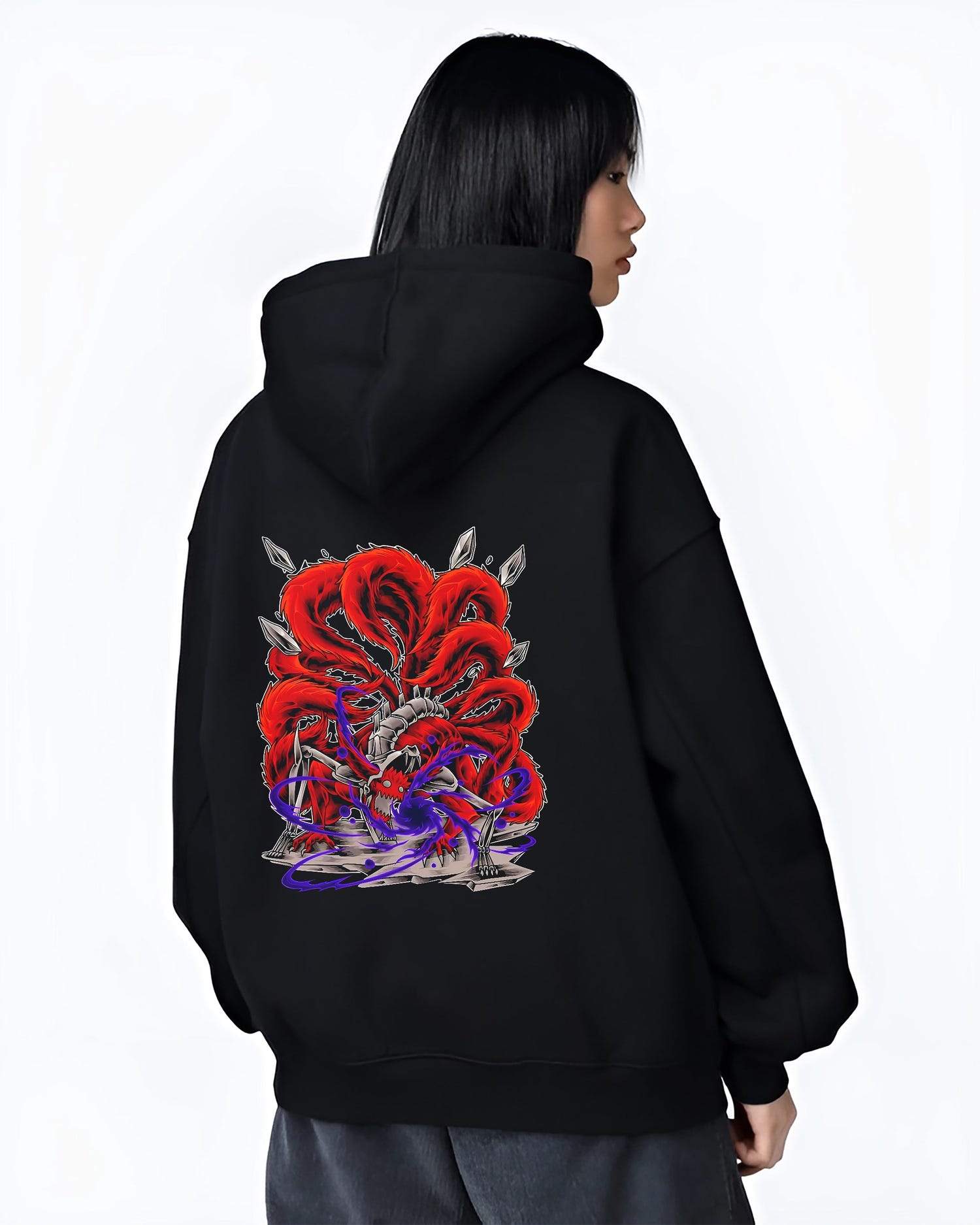 Black hoodie worn by a female model, back view, featuring Naruto Kurama Nine-Tails anime poster inspired artwork with fierce red tails and purple chakra aura effect.