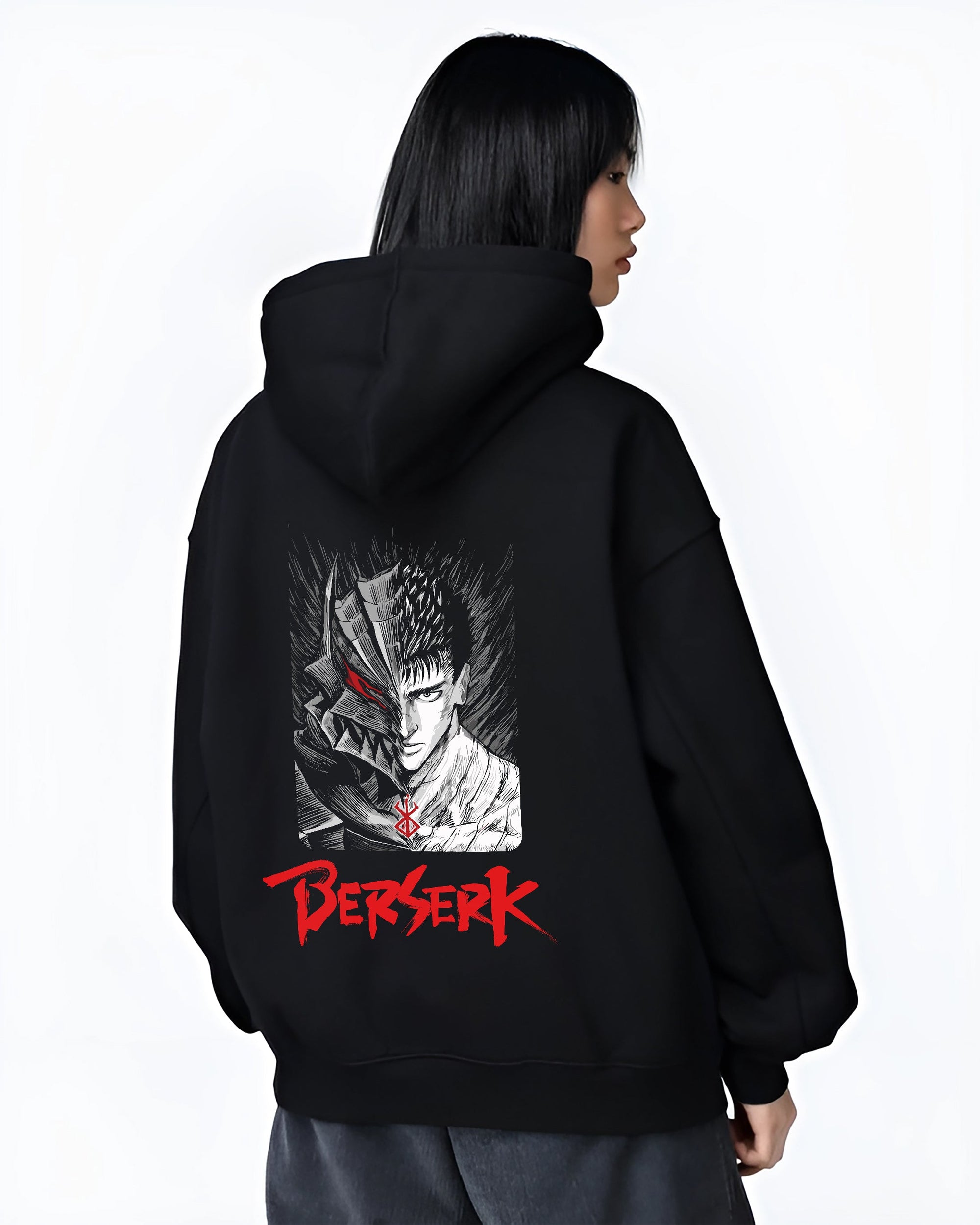 Black hoodie worn by a female model, back view, featuring Berserk Guts anime poster inspired half armor face design with bold red Berserk lettering in dark manga style.