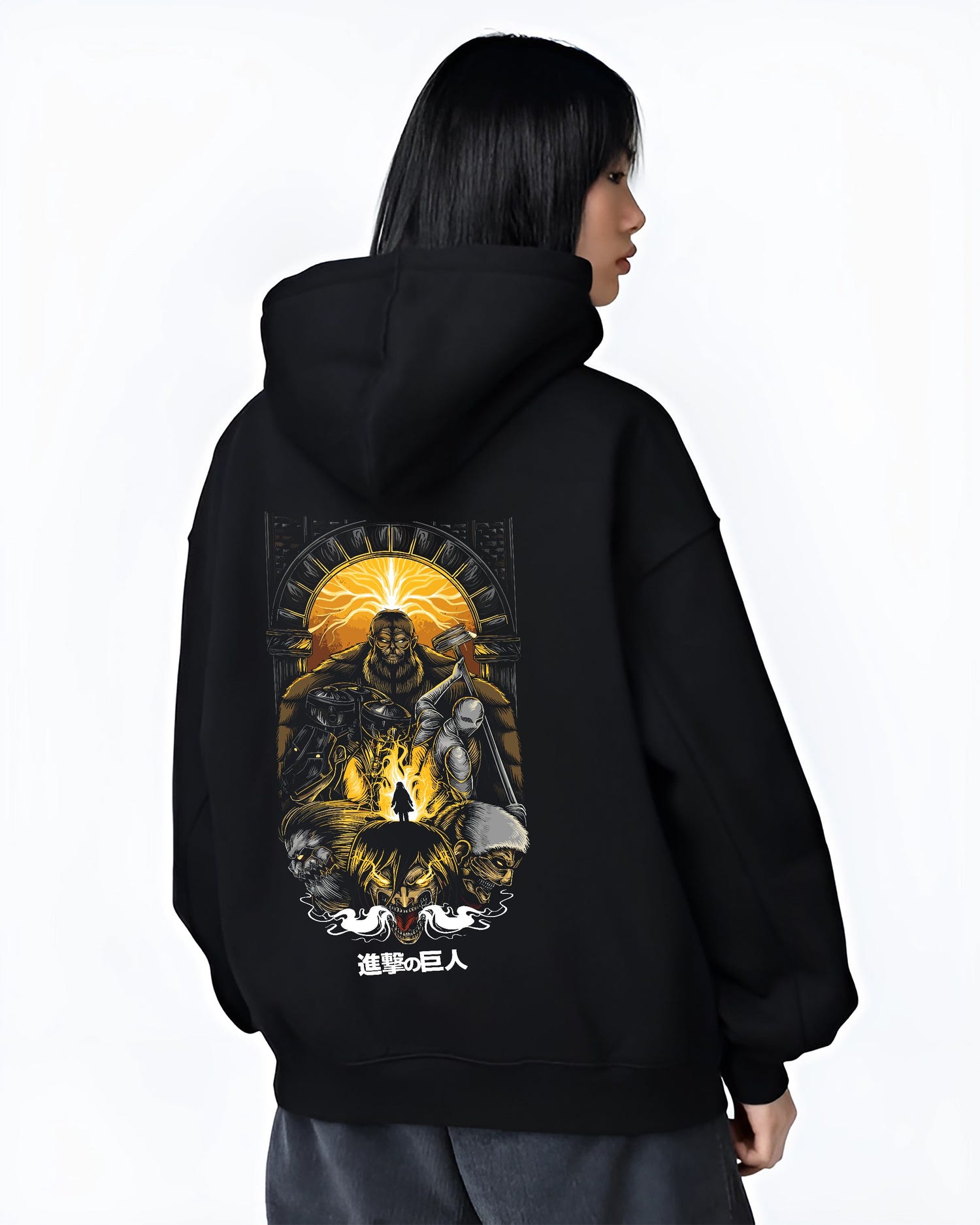 Black hoodie worn by a female model, back view, featuring Attack on Titan anime poster inspired artwork print with apocalyptic manga aesthetic design in retro streetwear style