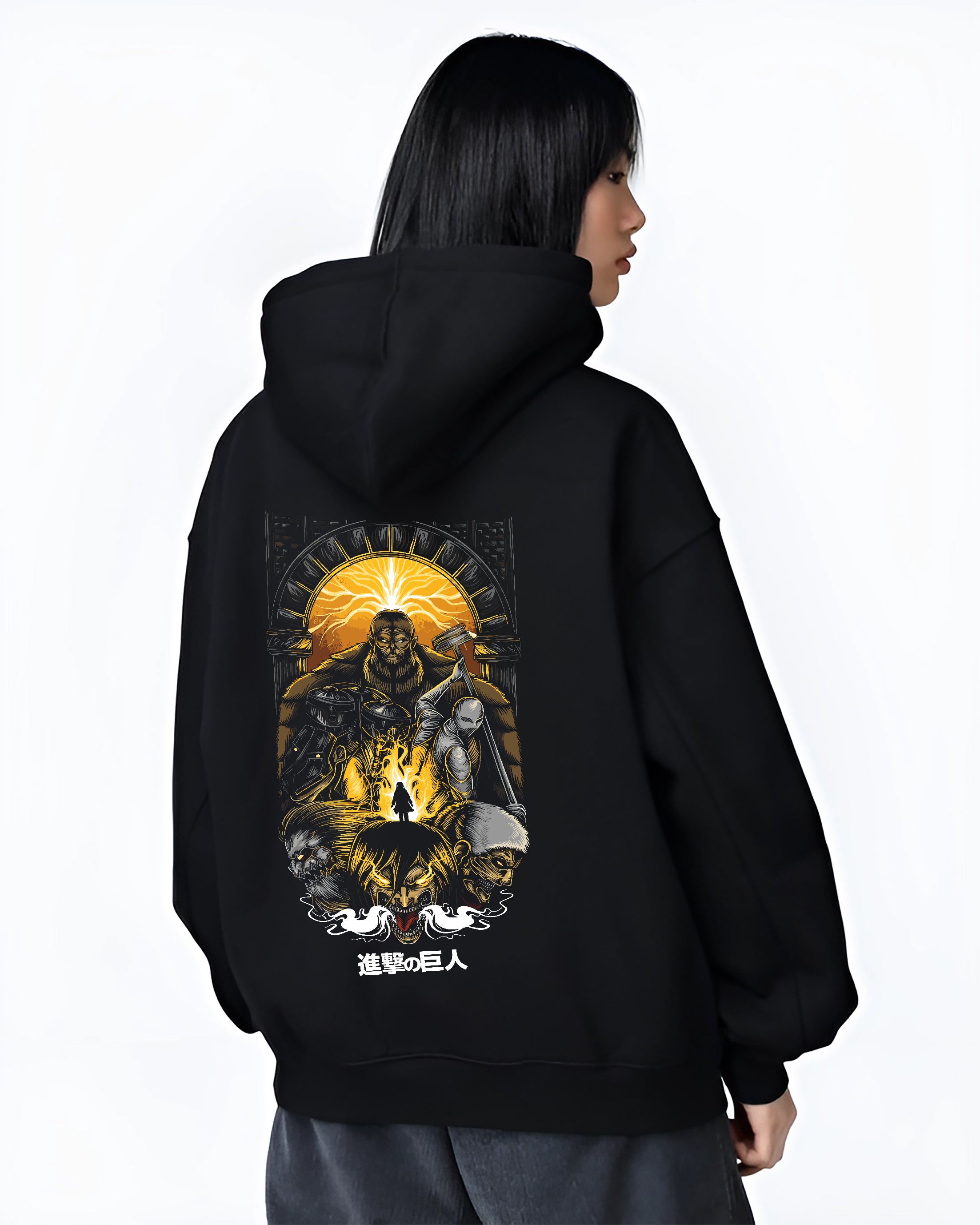 Black hoodie worn by a female model, back view, featuring Attack on Titan anime poster inspired artwork print with apocalyptic manga aesthetic design in retro streetwear style